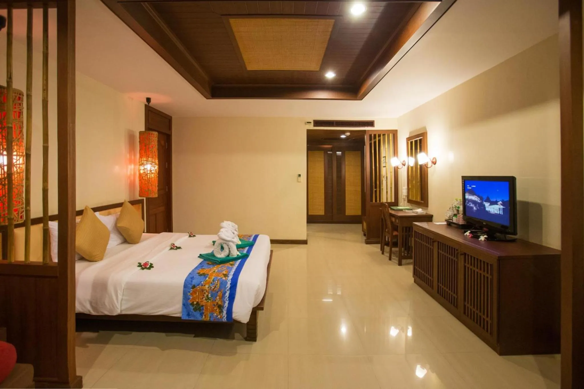Photo of the whole room, Bed in Hotel and Beach Bungalow at Lanta Resort