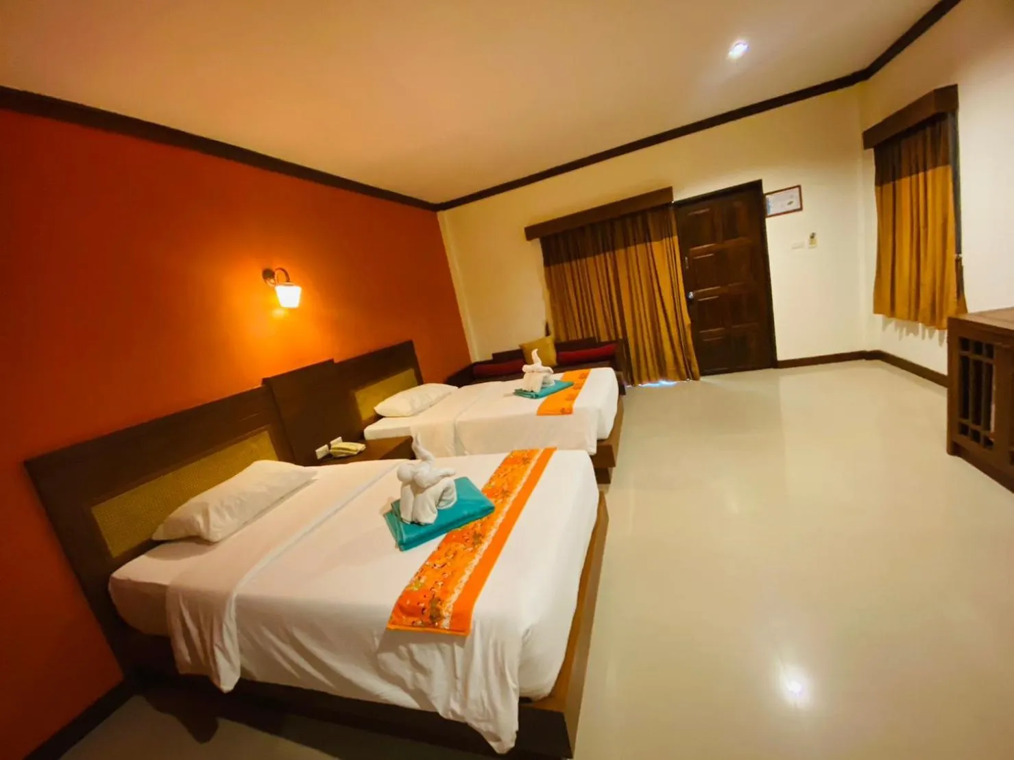 Bed in Hotel and Beach Bungalow at Lanta Resort