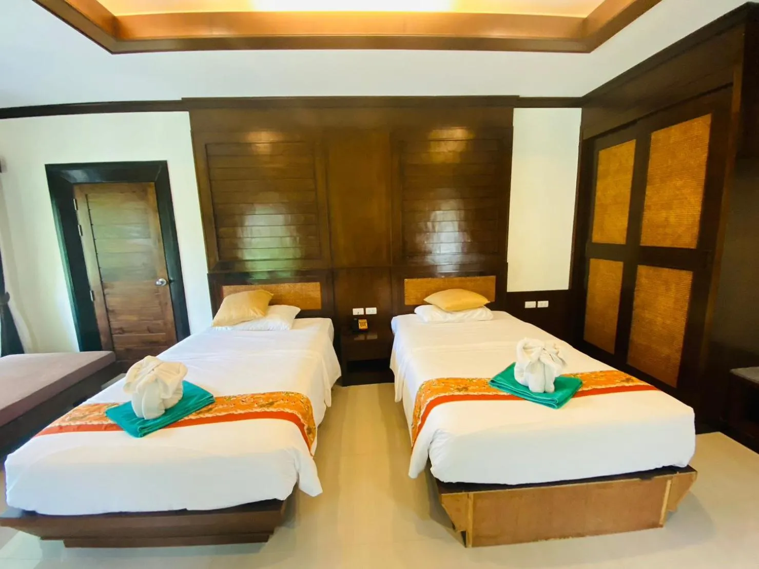 Bedroom, Bed in Hotel and Beach Bungalow at Lanta Resort