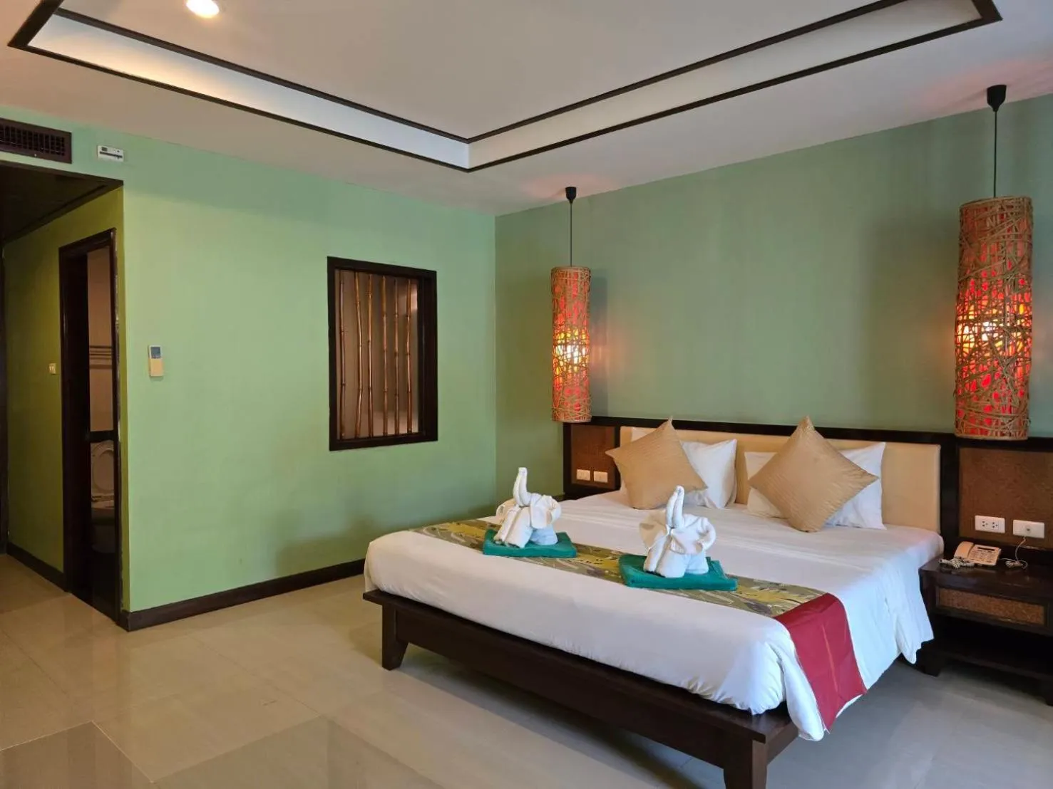 Bed in Hotel and Beach Bungalow at Lanta Resort