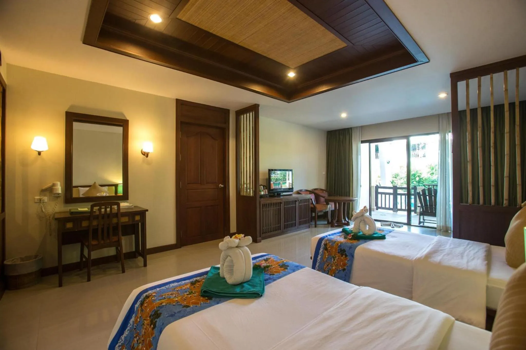 Bed in Hotel and Beach Bungalow at Lanta Resort