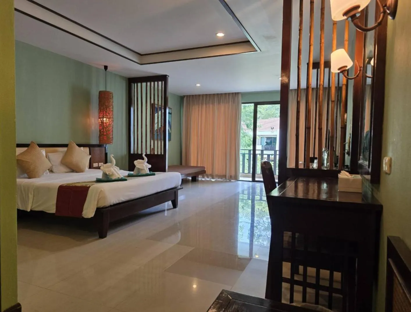 Bed in Hotel and Beach Bungalow at Lanta Resort