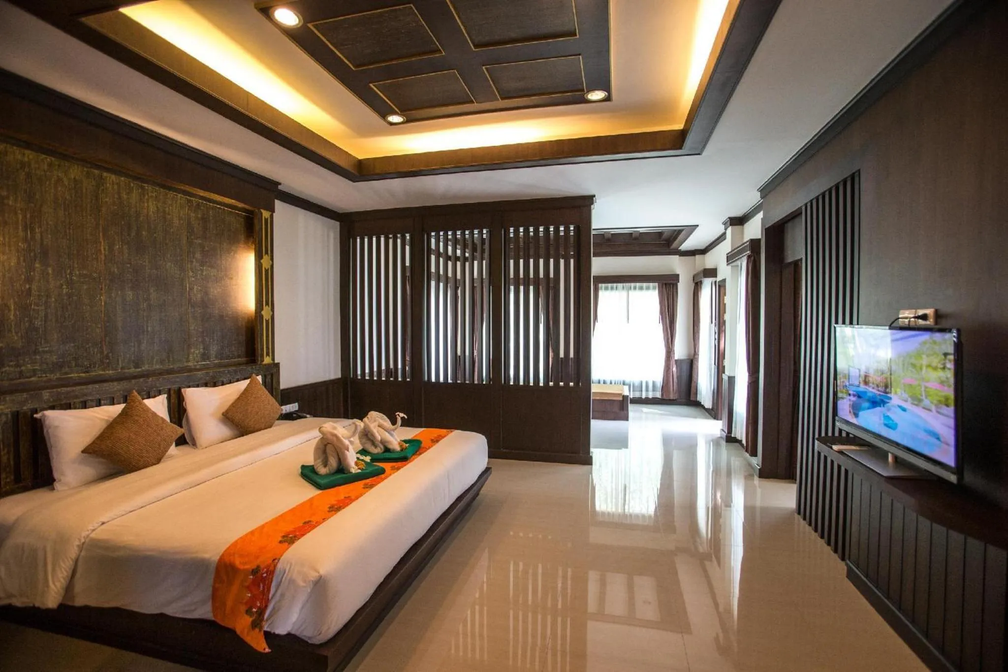 Living room, Bed in Hotel and Beach Bungalow at Lanta Resort