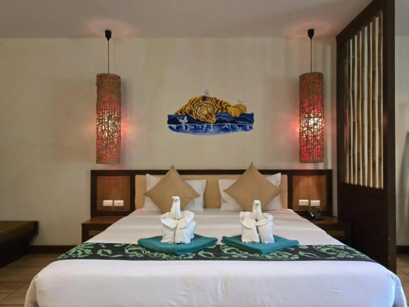 Bed in Hotel and Beach Bungalow at Lanta Resort