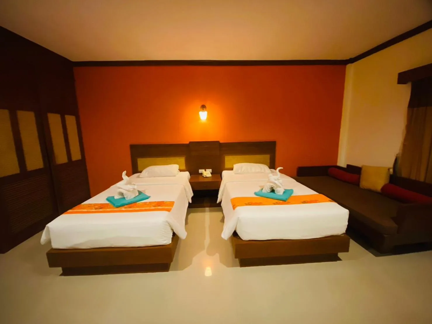Bed in Hotel and Beach Bungalow at Lanta Resort