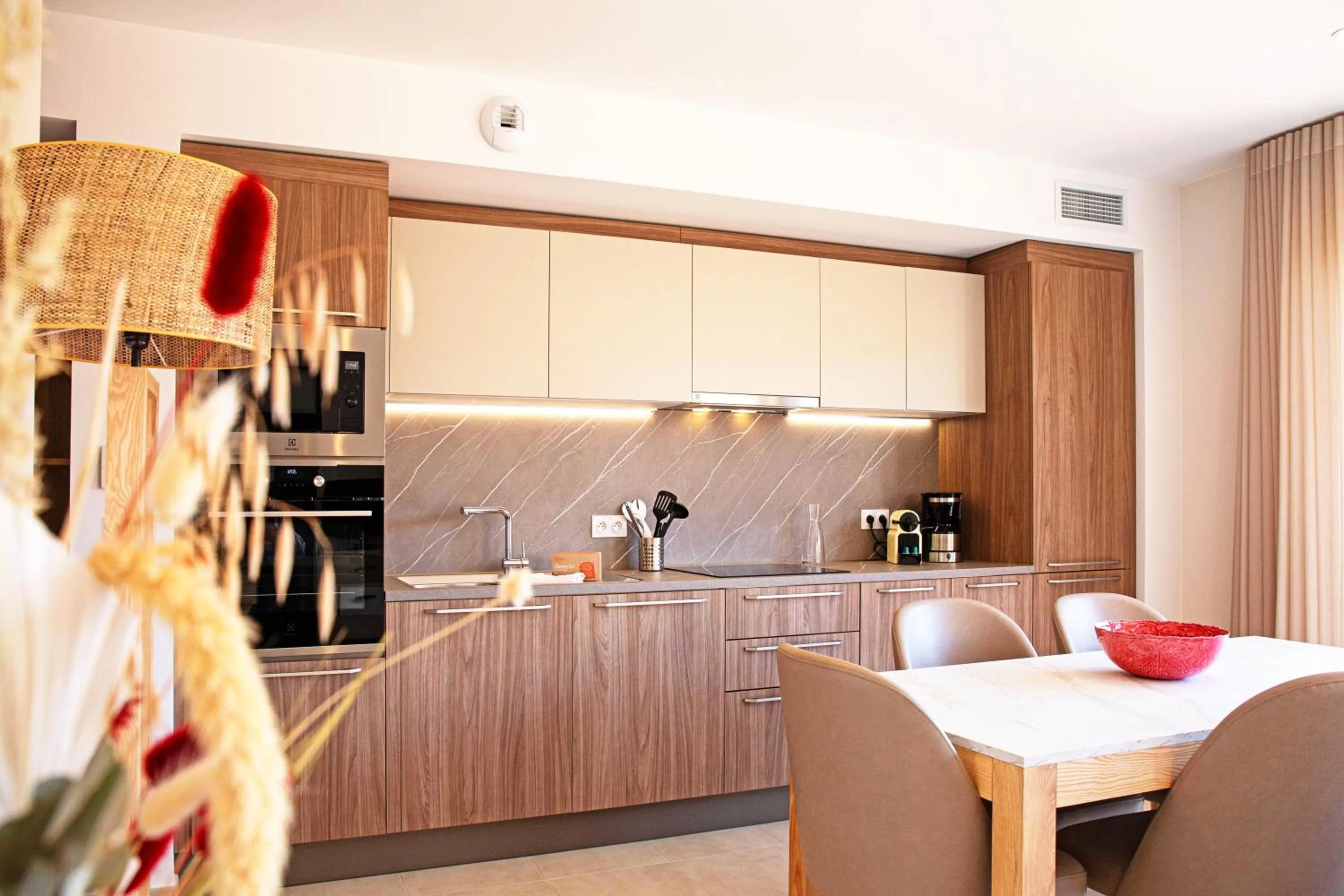 Kitchen or kitchenette in Résidence Pierre & Vacances Premium Domaine du Golfe du Lion