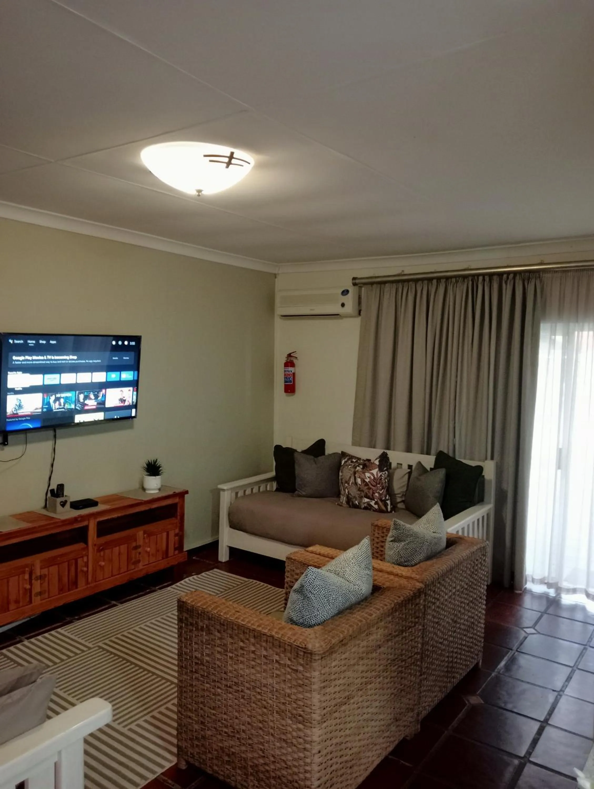 Communal lounge/ TV room in A Cherry Lane Self Catering and B&B