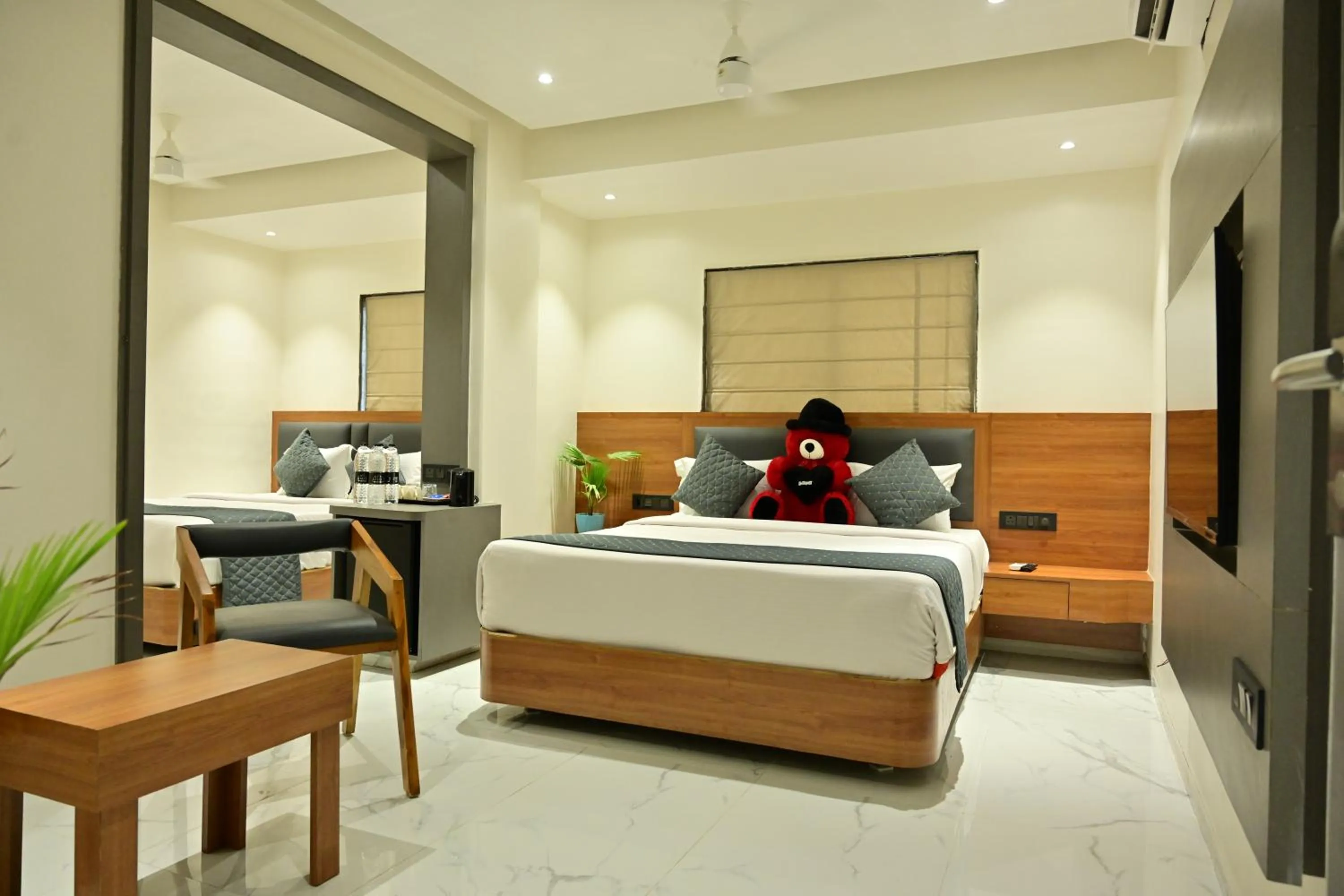 Communal lounge/ TV room, Bed in Hotel Sai Kamal