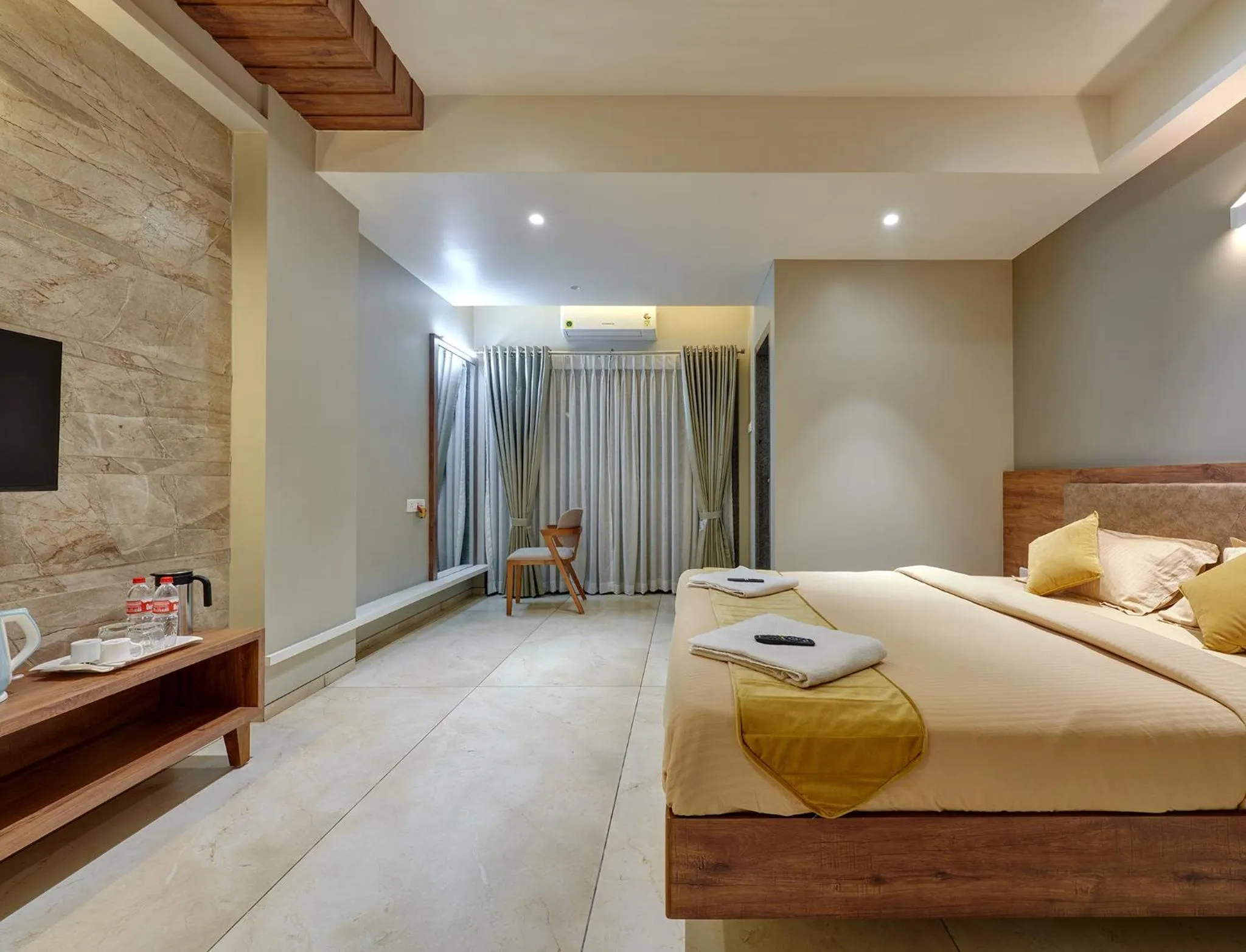 Photo of the whole room, Bed in Hotel Swamini Kolhapur