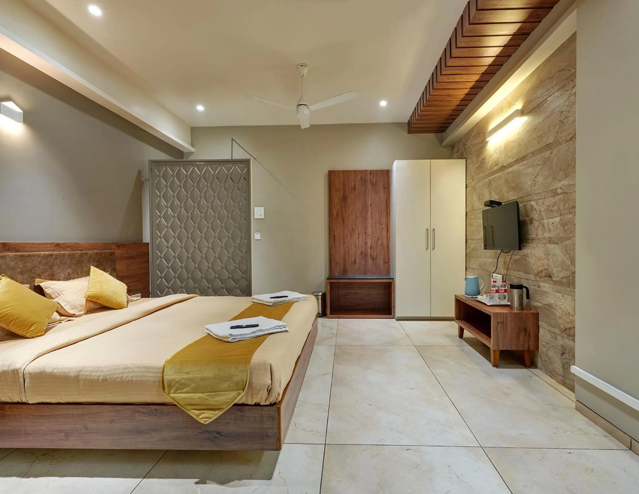 Photo of the whole room, Bed in Hotel Swamini Kolhapur