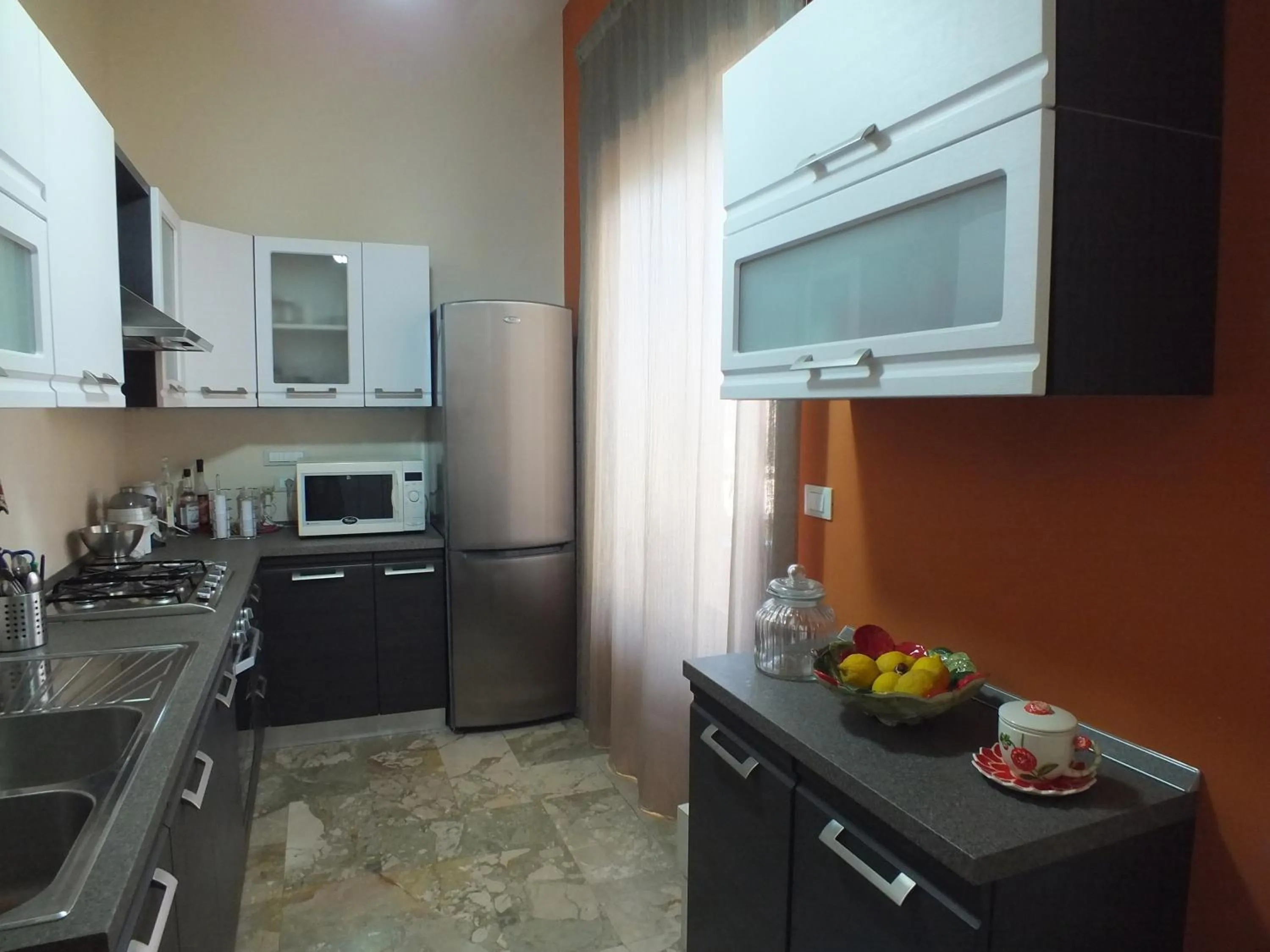 Kitchen or kitchenette in Villa Lazzari B&B Tra i due Mari