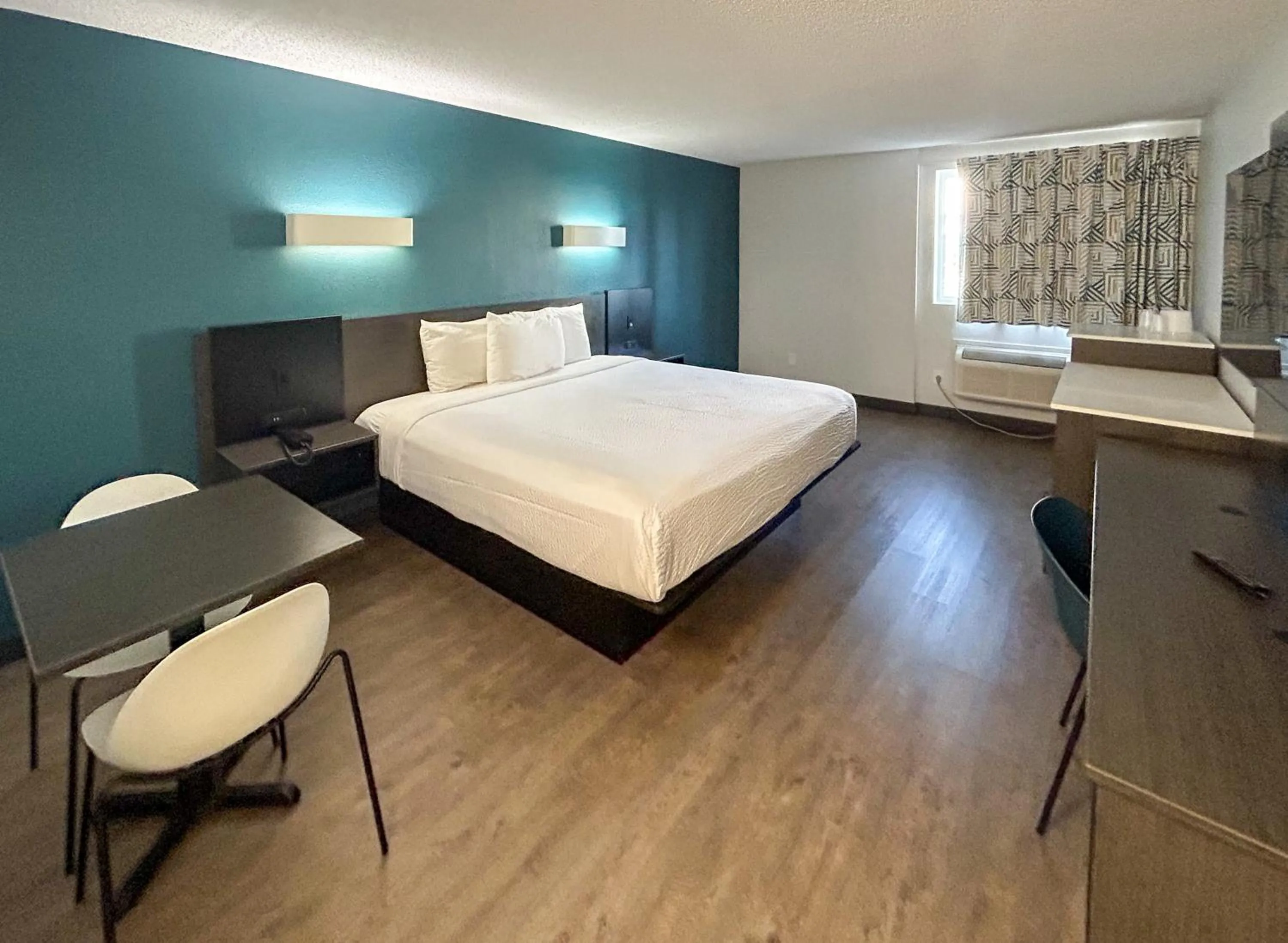 Bedroom, Bed in Studio 6 Suites Carson, CA