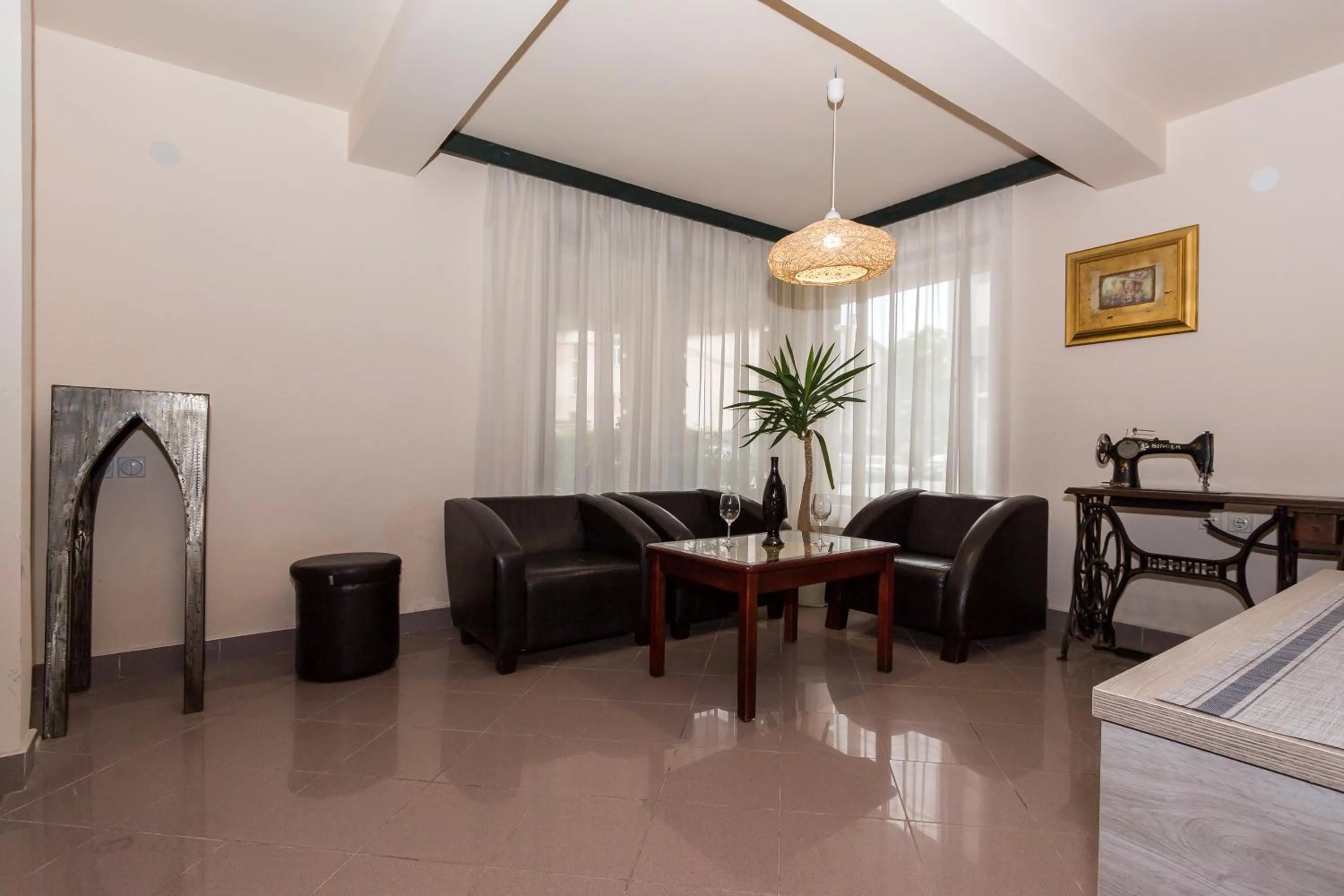 Seating area, Bed in Bitrak Guest House