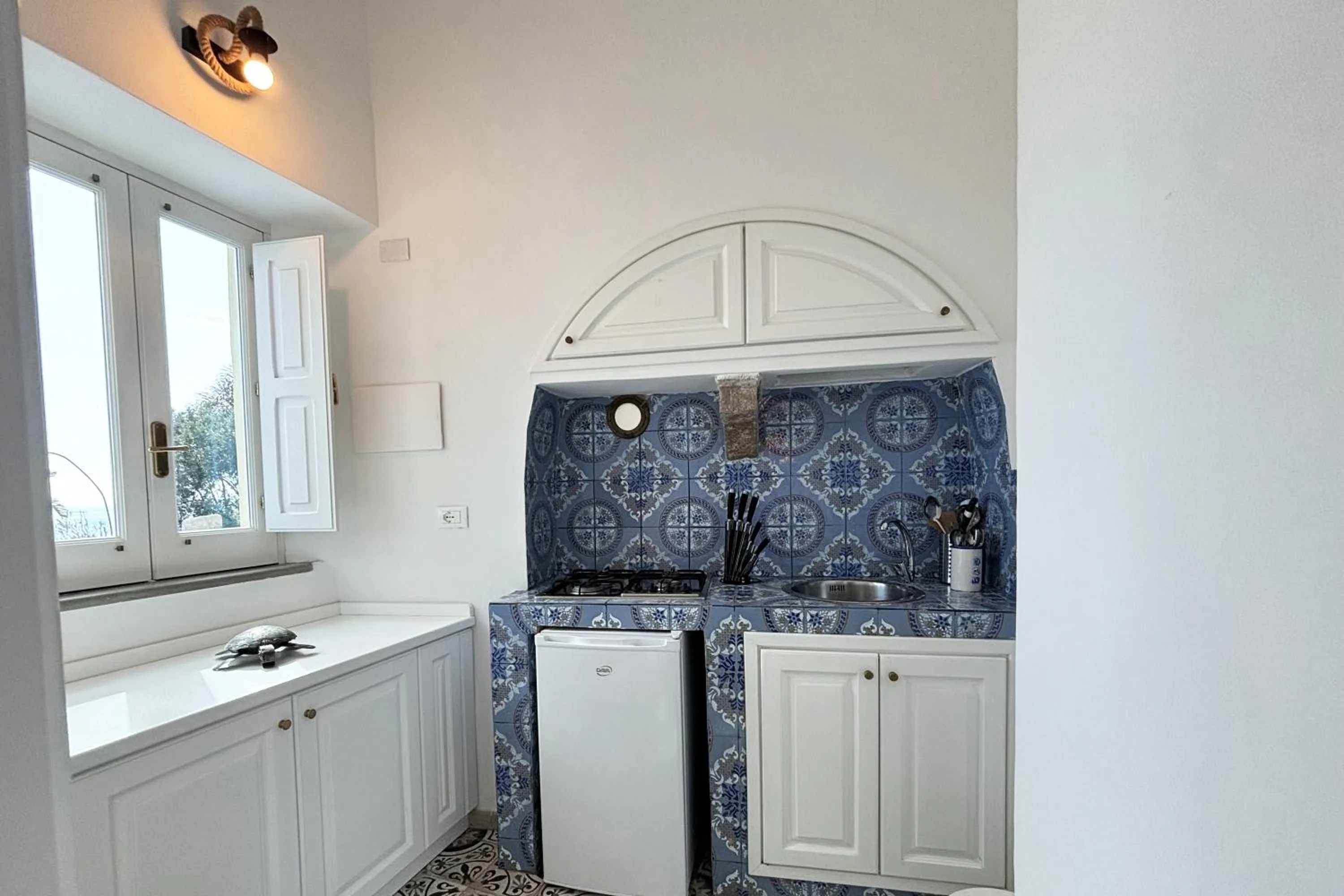 Kitchen or kitchenette in Casa Acquamarina
