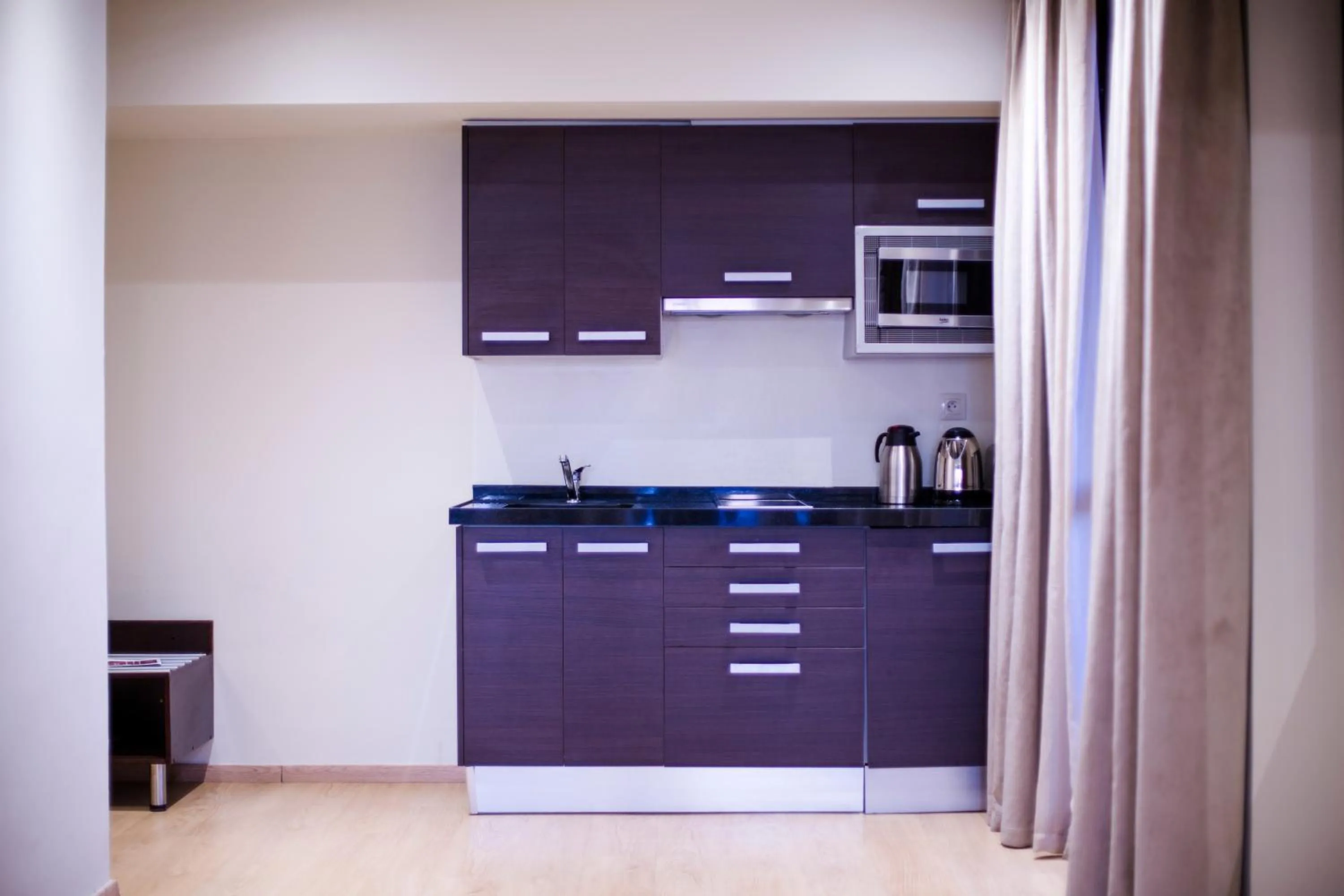 Kitchen or kitchenette in Le Rio Appart-Hotel City Center