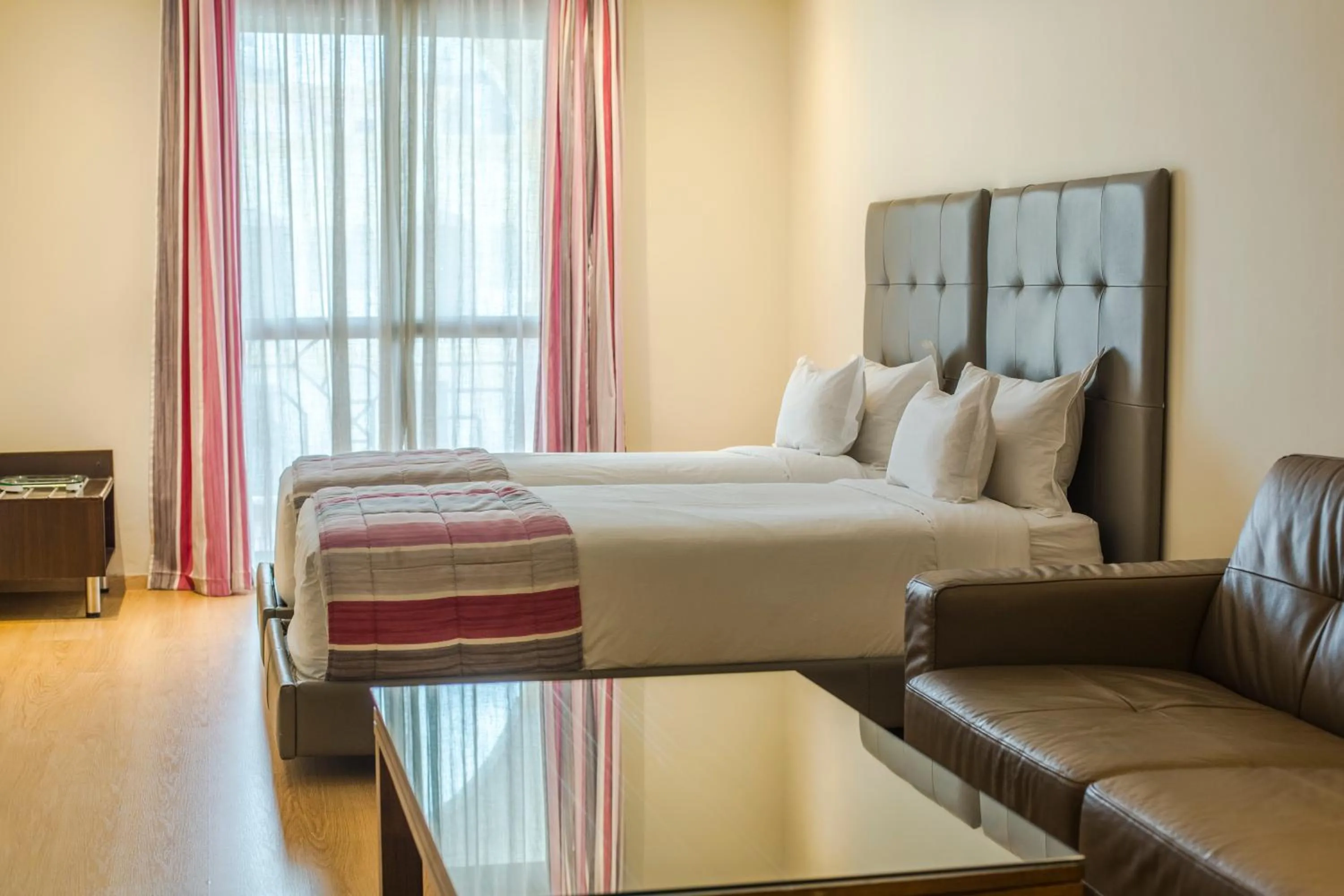 Bed in Le Rio Appart-Hotel City Center