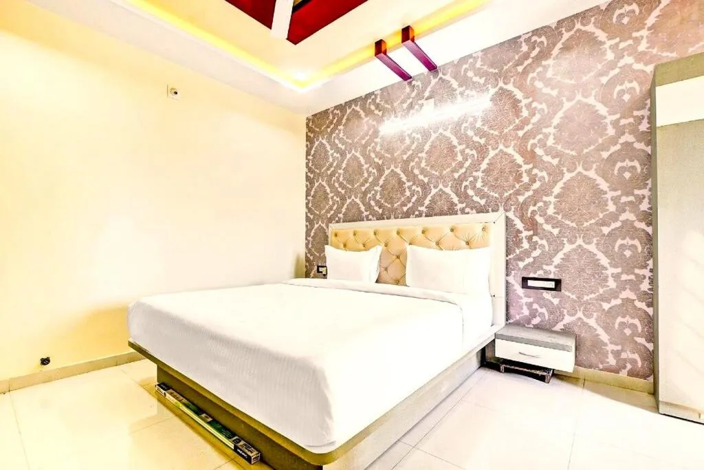 Bed in Hotel Sun Palace