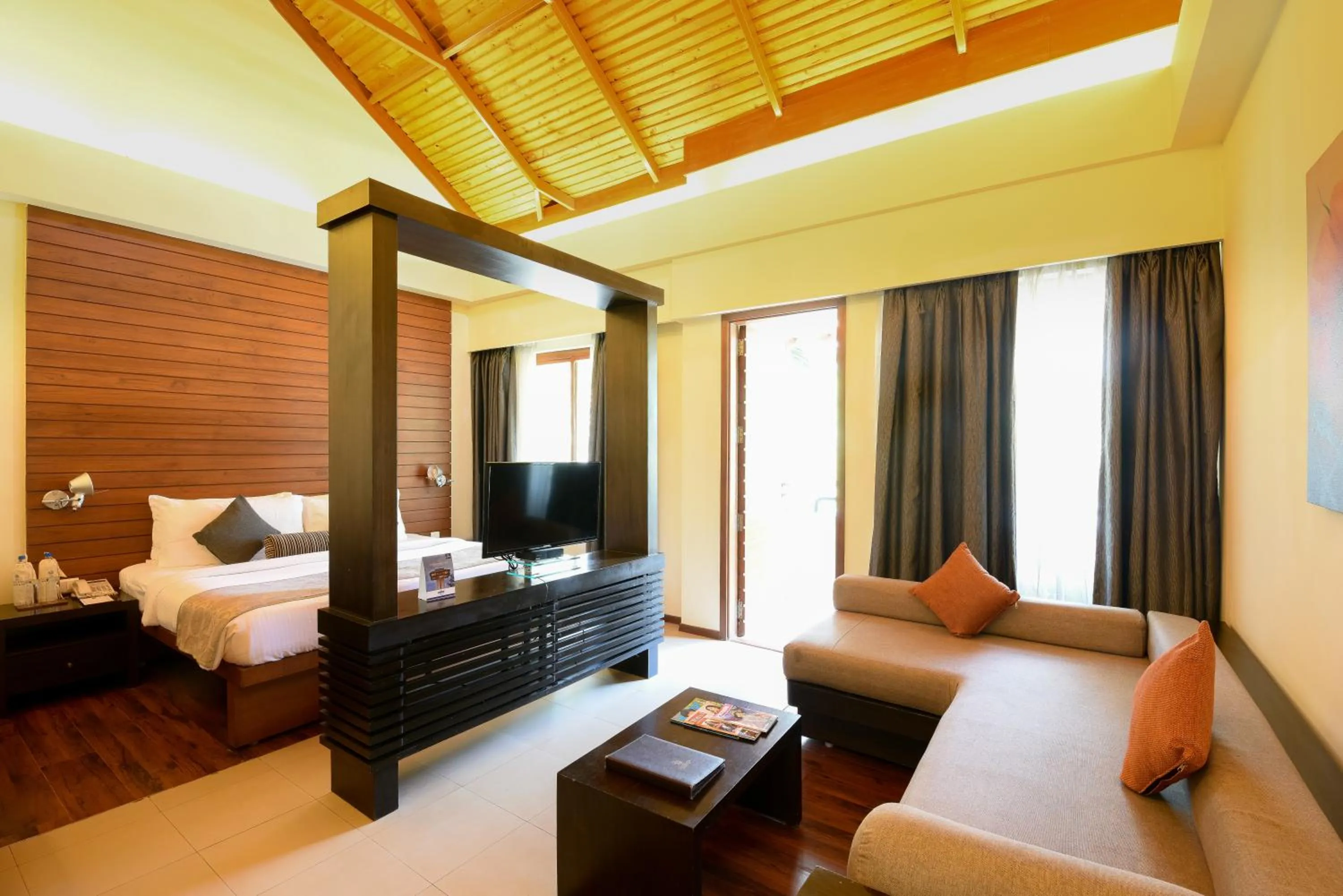 Bed in The Golkonda Resort and Spa
