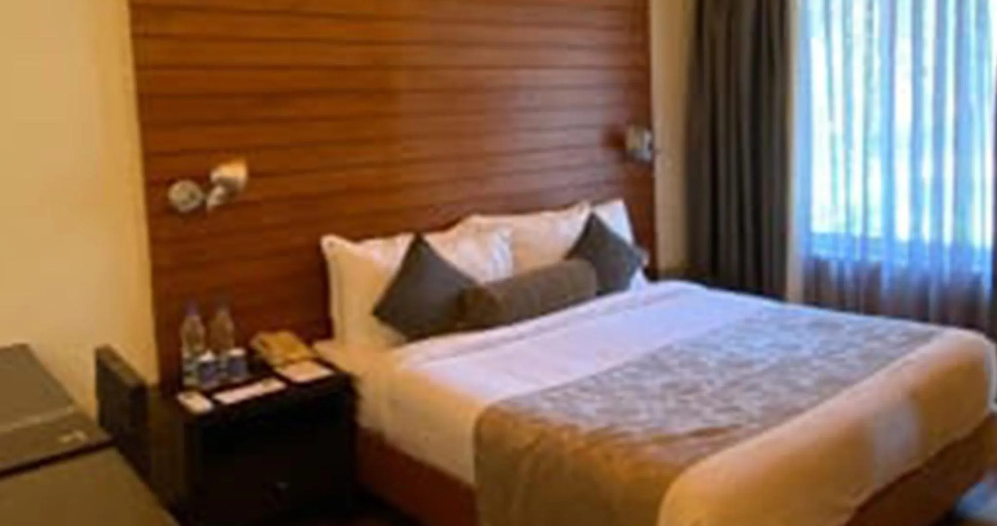 Bed in The Golkonda Resort and Spa