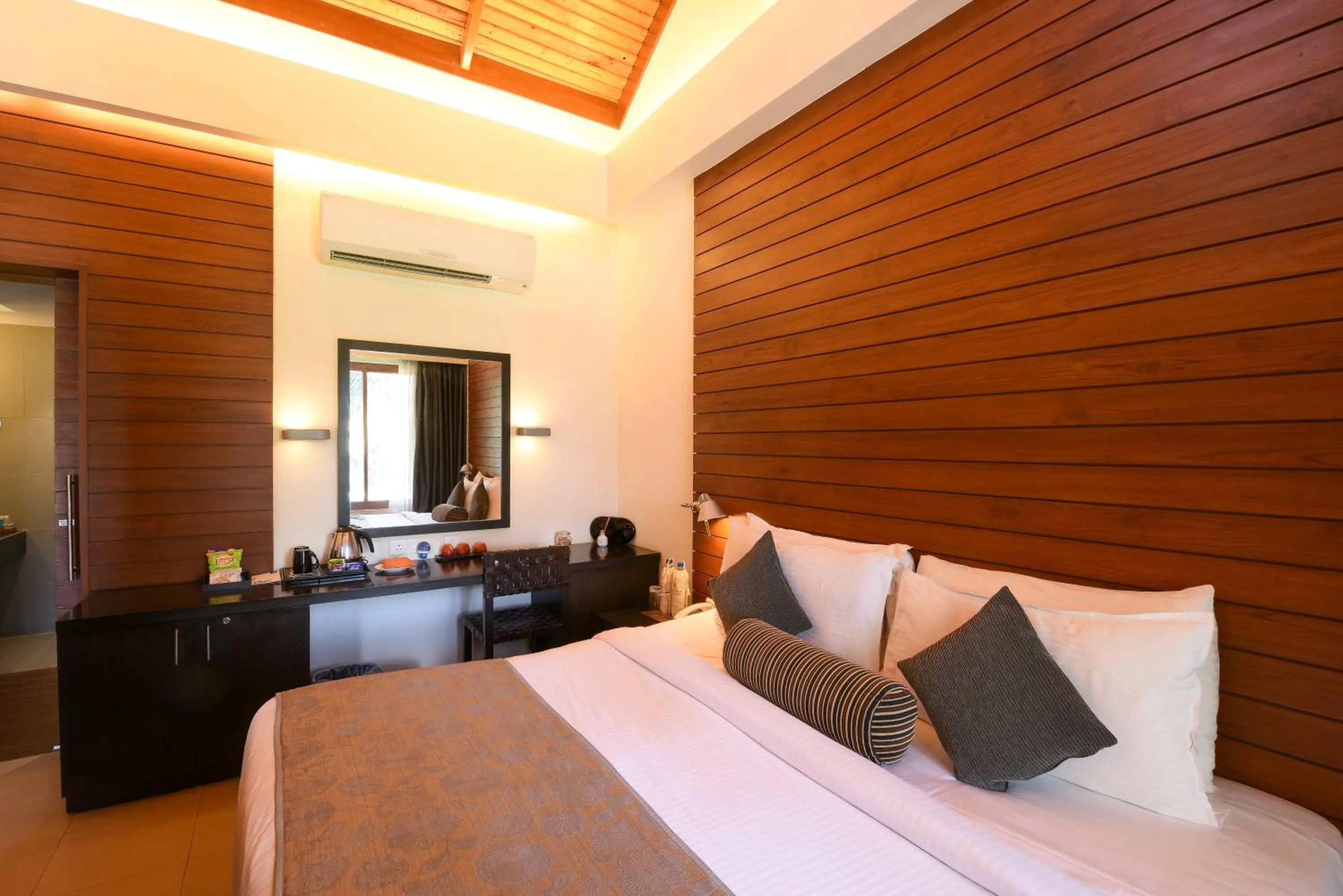 Bed in The Golkonda Resort and Spa