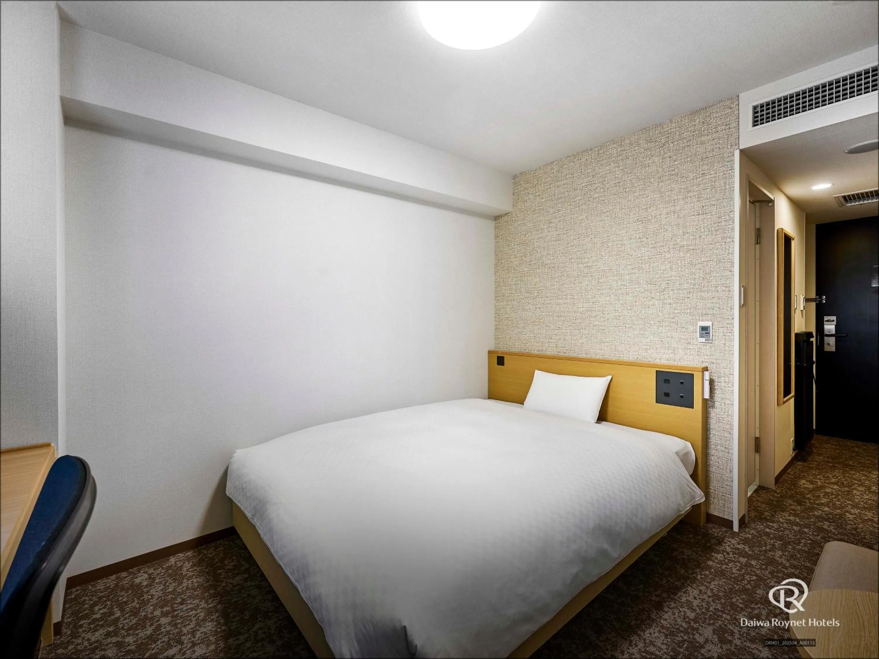 Bed in Daiwa Roynet Hotel Morioka