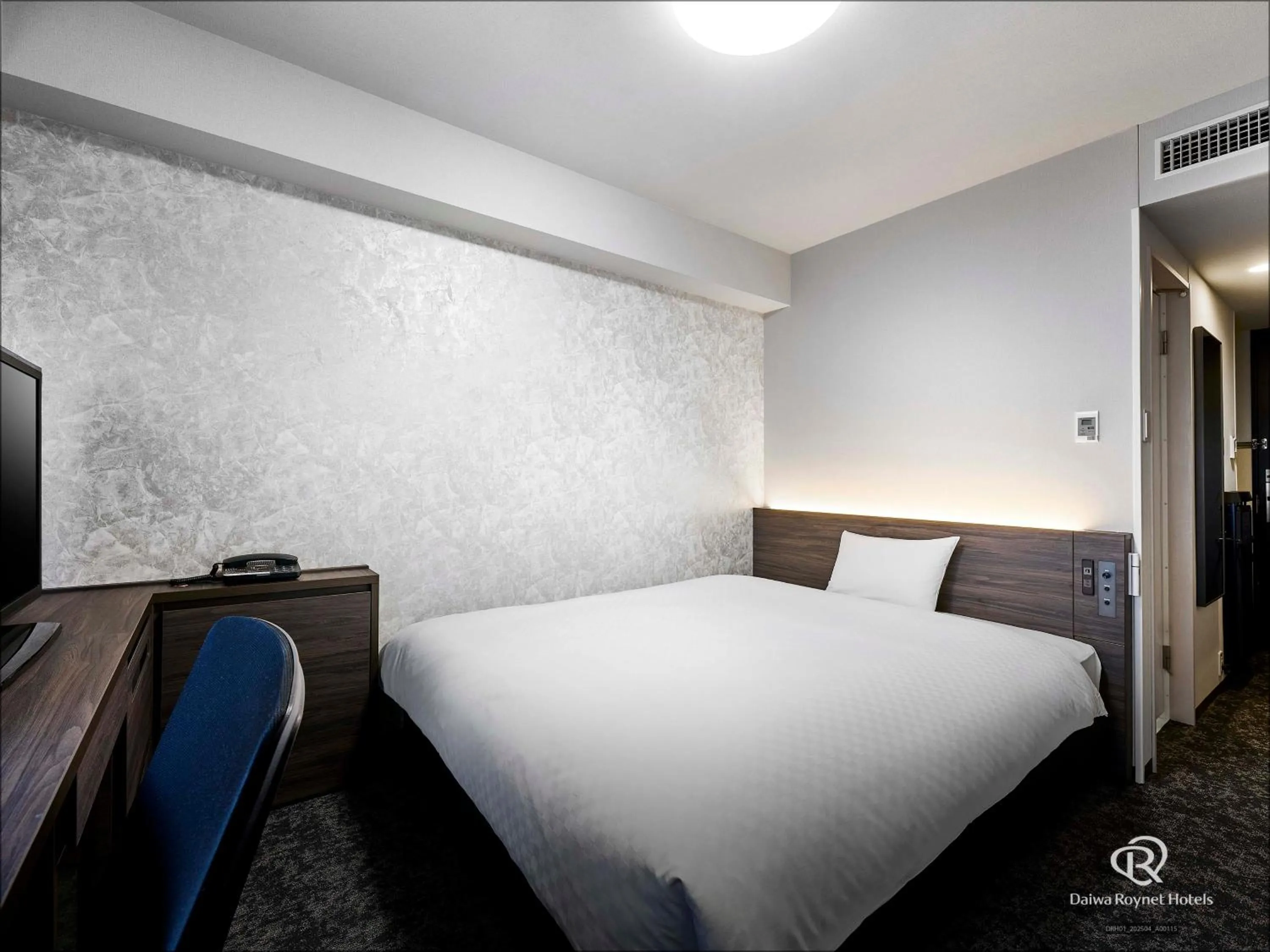 Bed in Daiwa Roynet Hotel Morioka