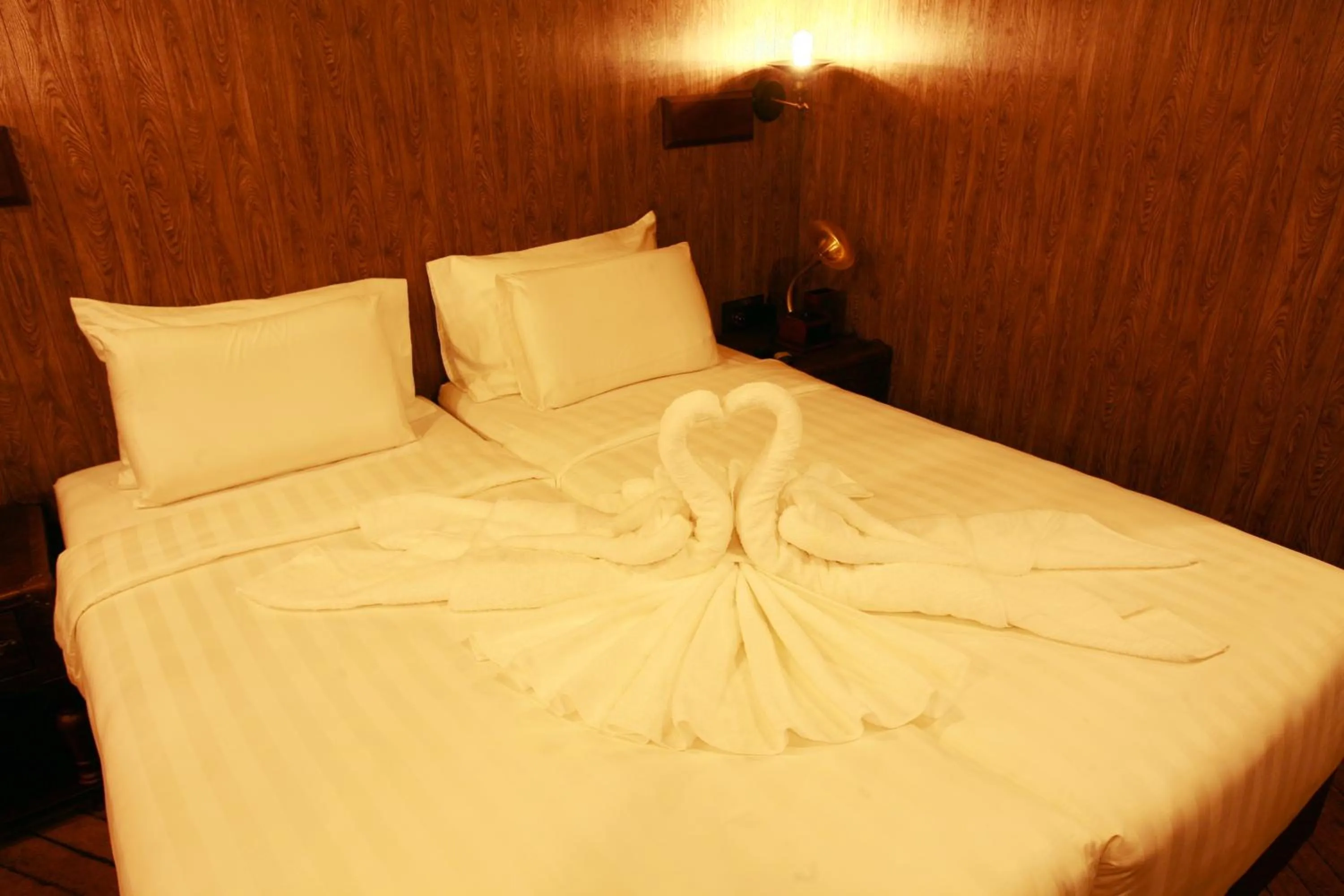 Bed in Vintage Luxury Yacht Hotel