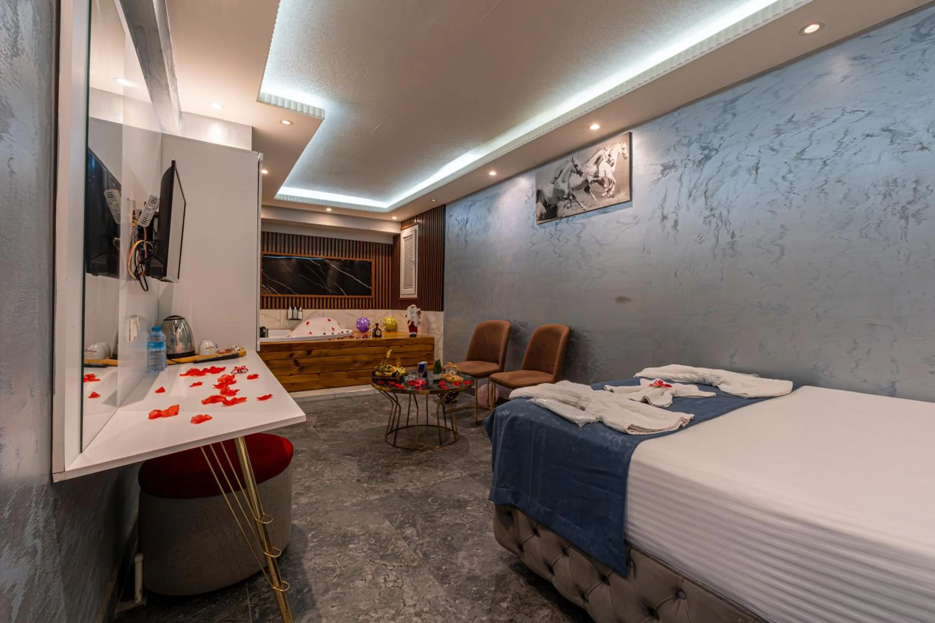 Bed in Stay Suite Hotel