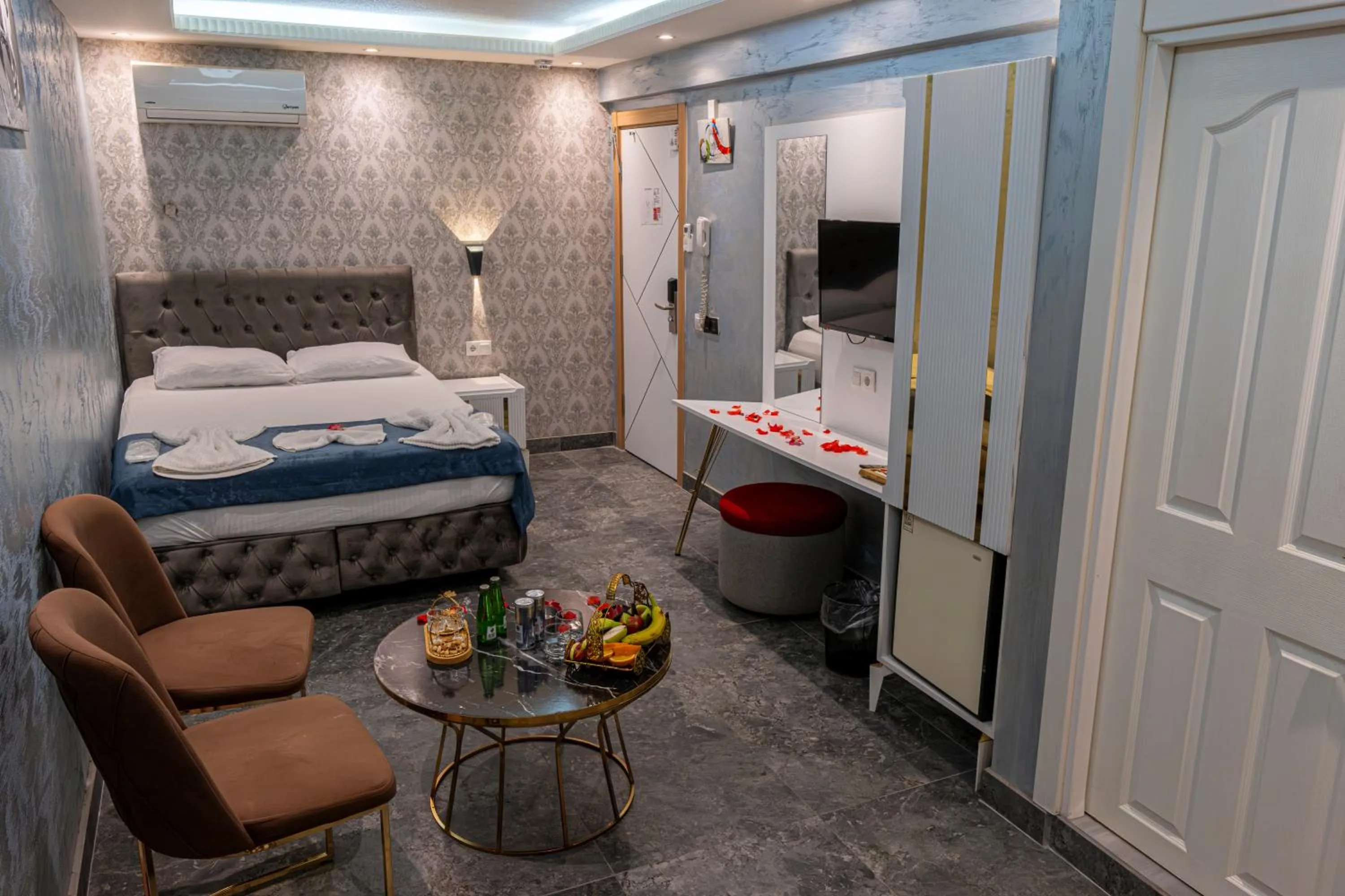 Bed in Stay Suite Hotel