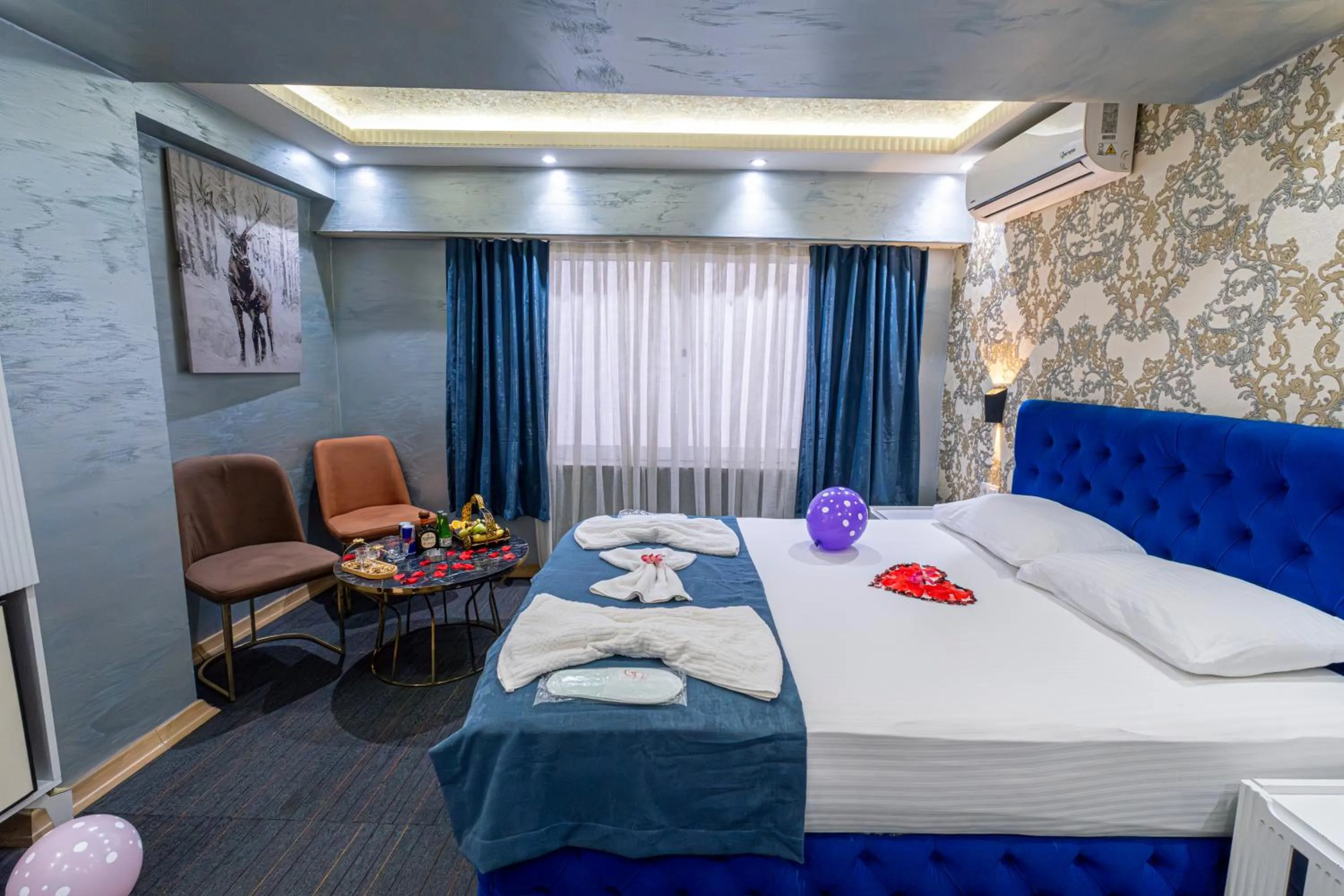 Bed in Stay Suite Hotel