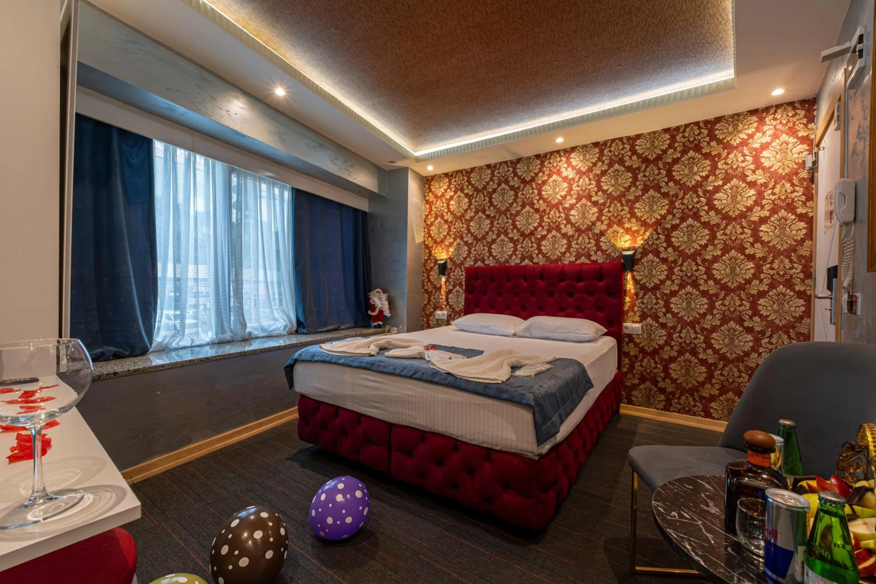 Bed in Stay Suite Hotel