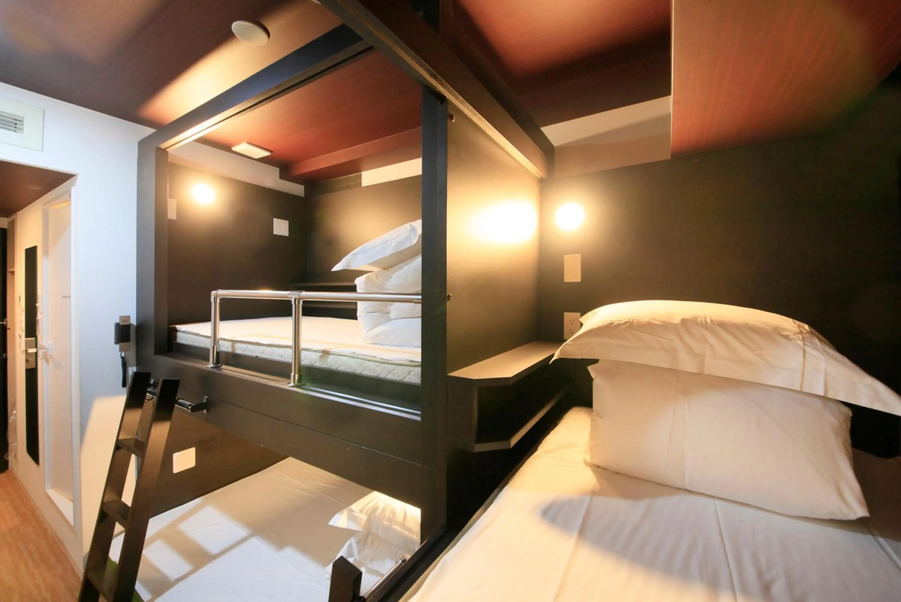 Photo of the whole room, Bed in Centurion Hotel Ikebukuro Station