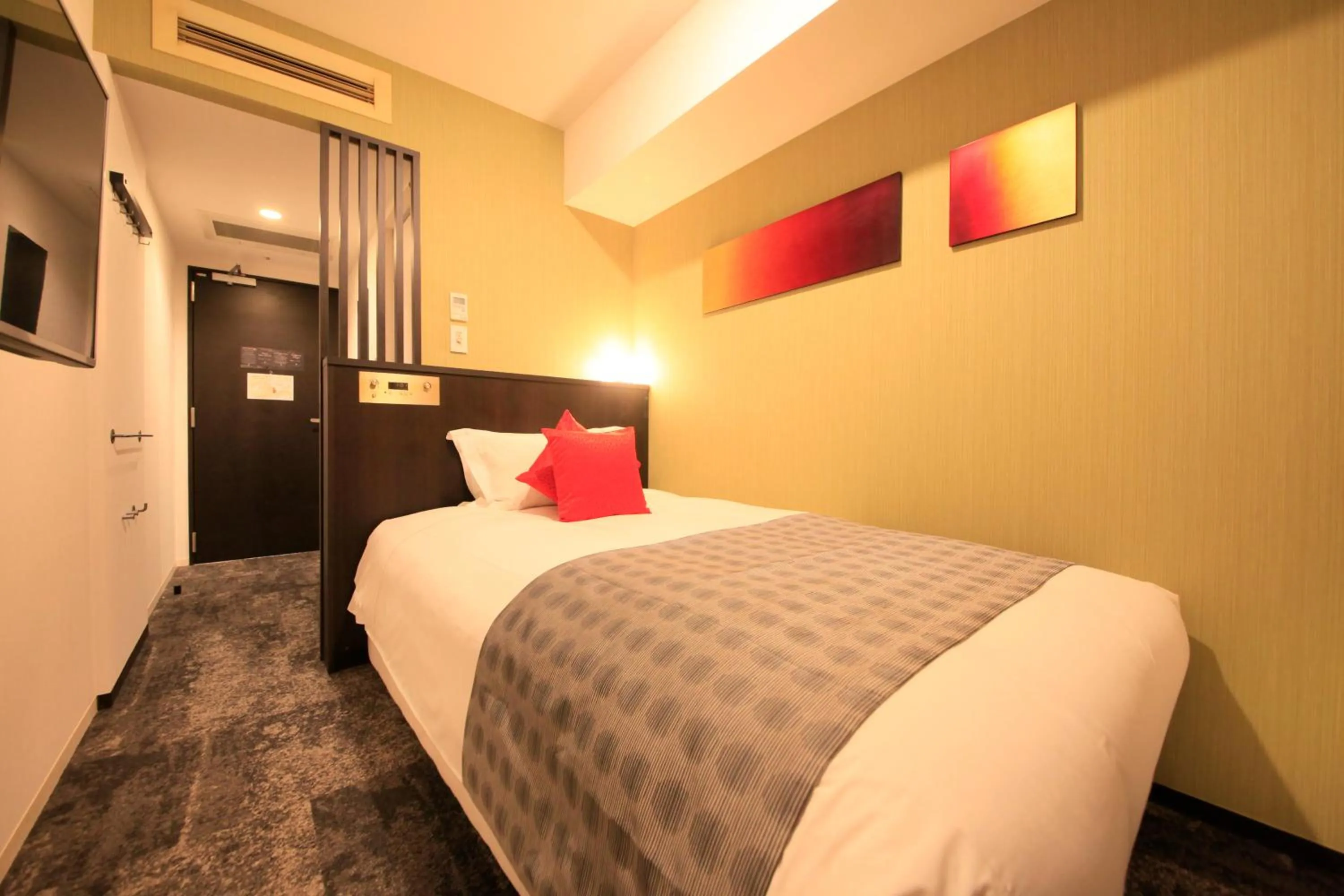 Photo of the whole room, Bed in Centurion Hotel Ikebukuro Station