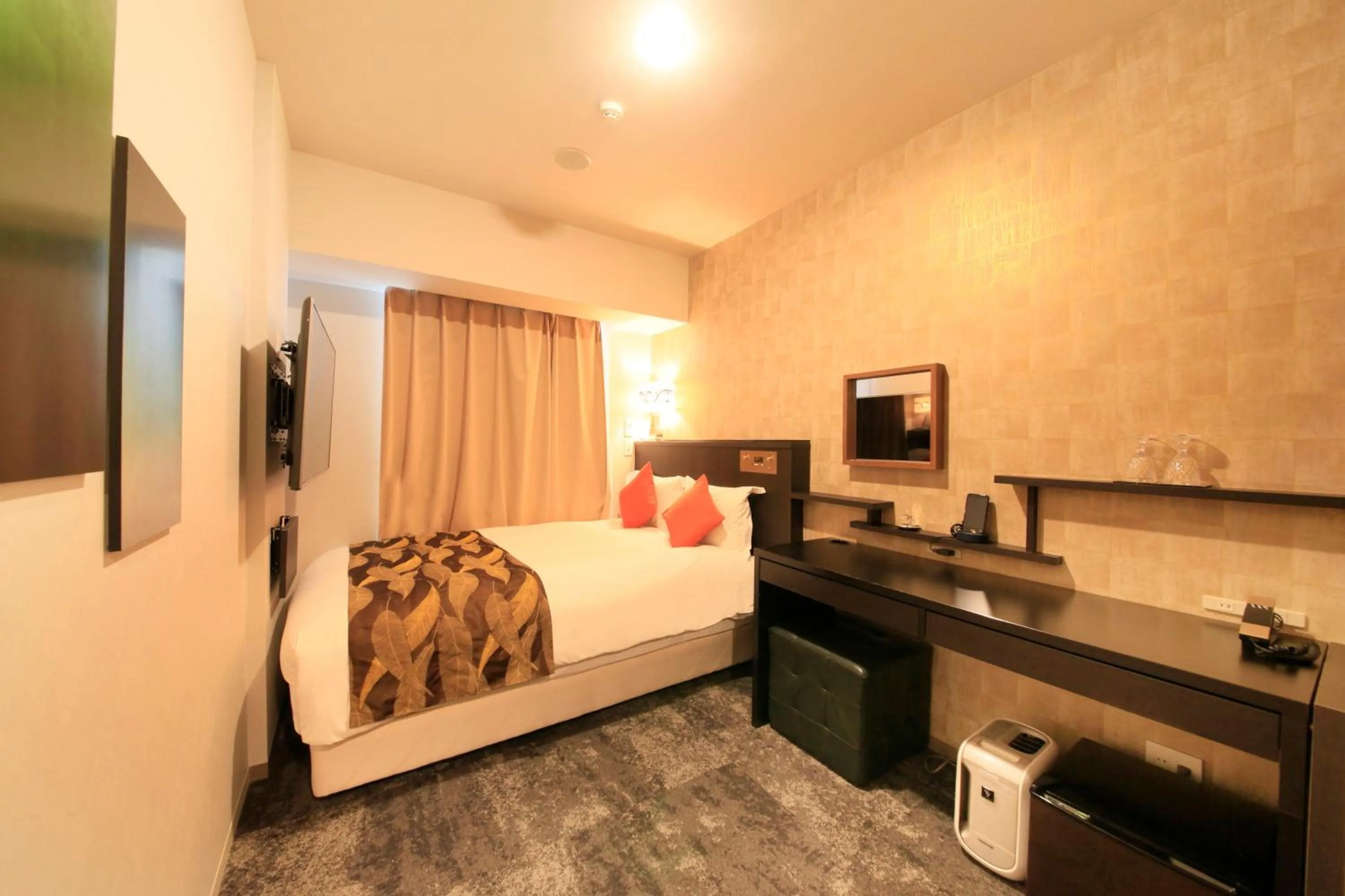 Photo of the whole room, Bed in Centurion Hotel Ikebukuro Station