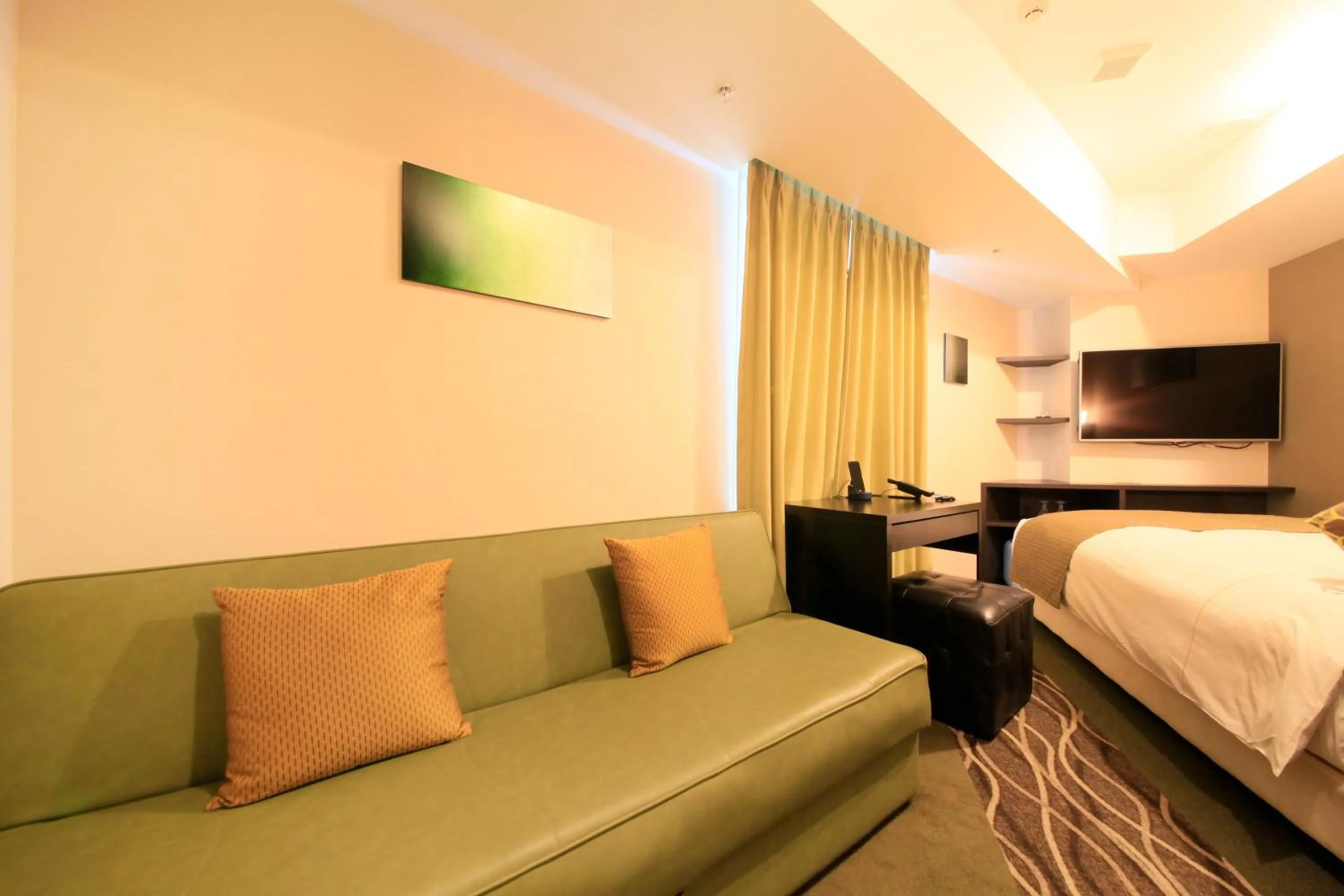 Photo of the whole room, Bed in Centurion Hotel Ikebukuro Station