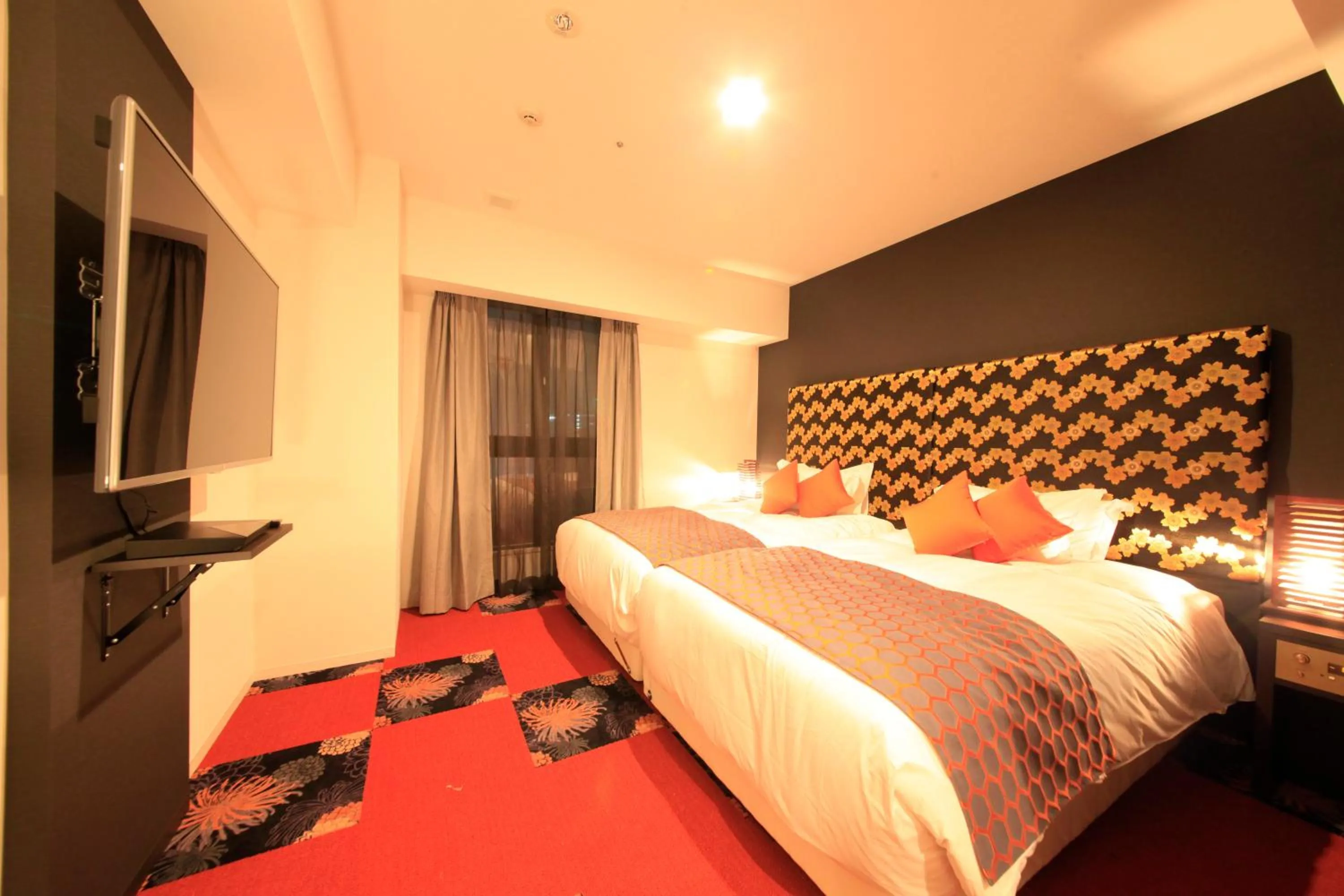 Photo of the whole room, Bed in Centurion Hotel Ikebukuro Station