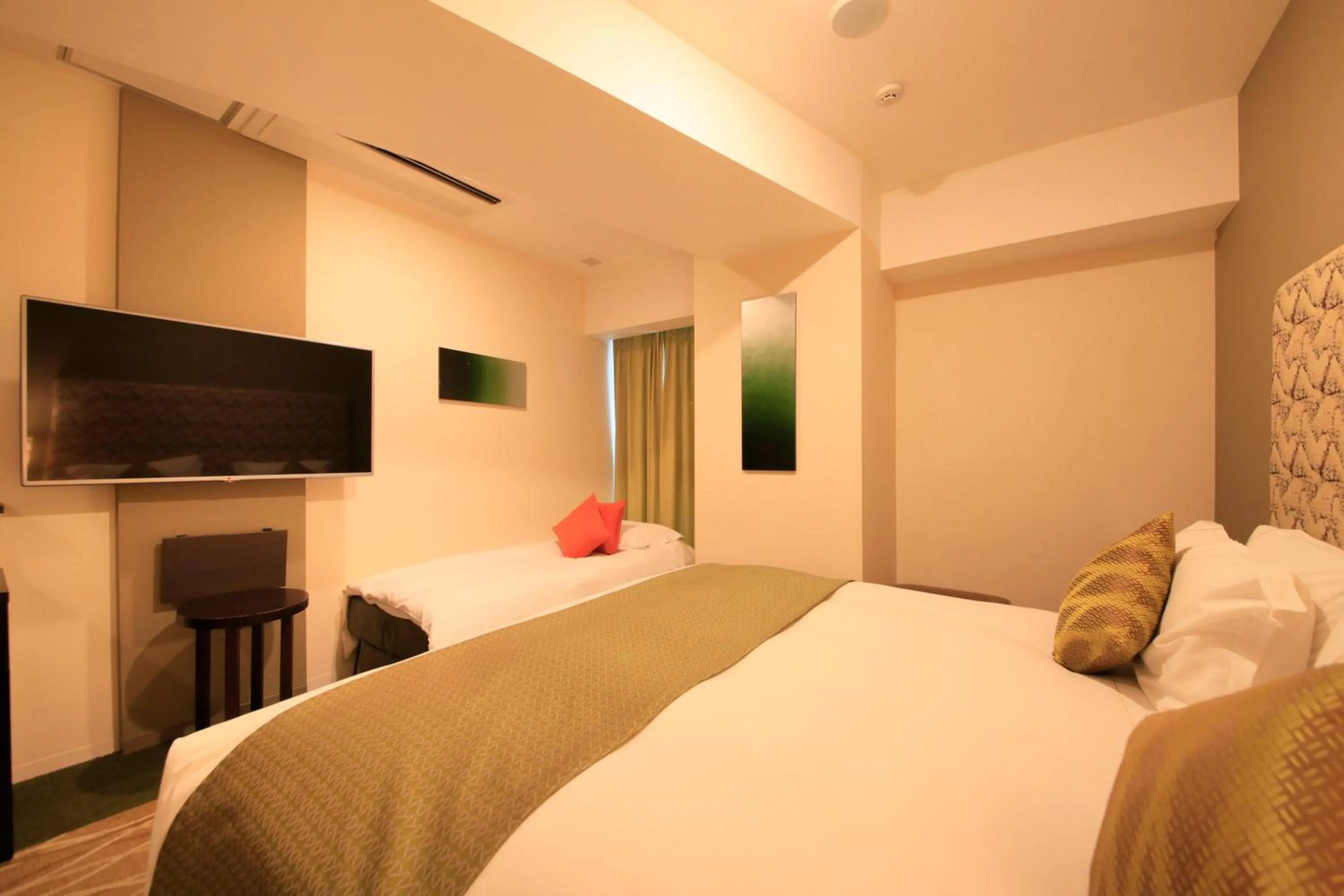 Photo of the whole room, Bed in Centurion Hotel Ikebukuro Station