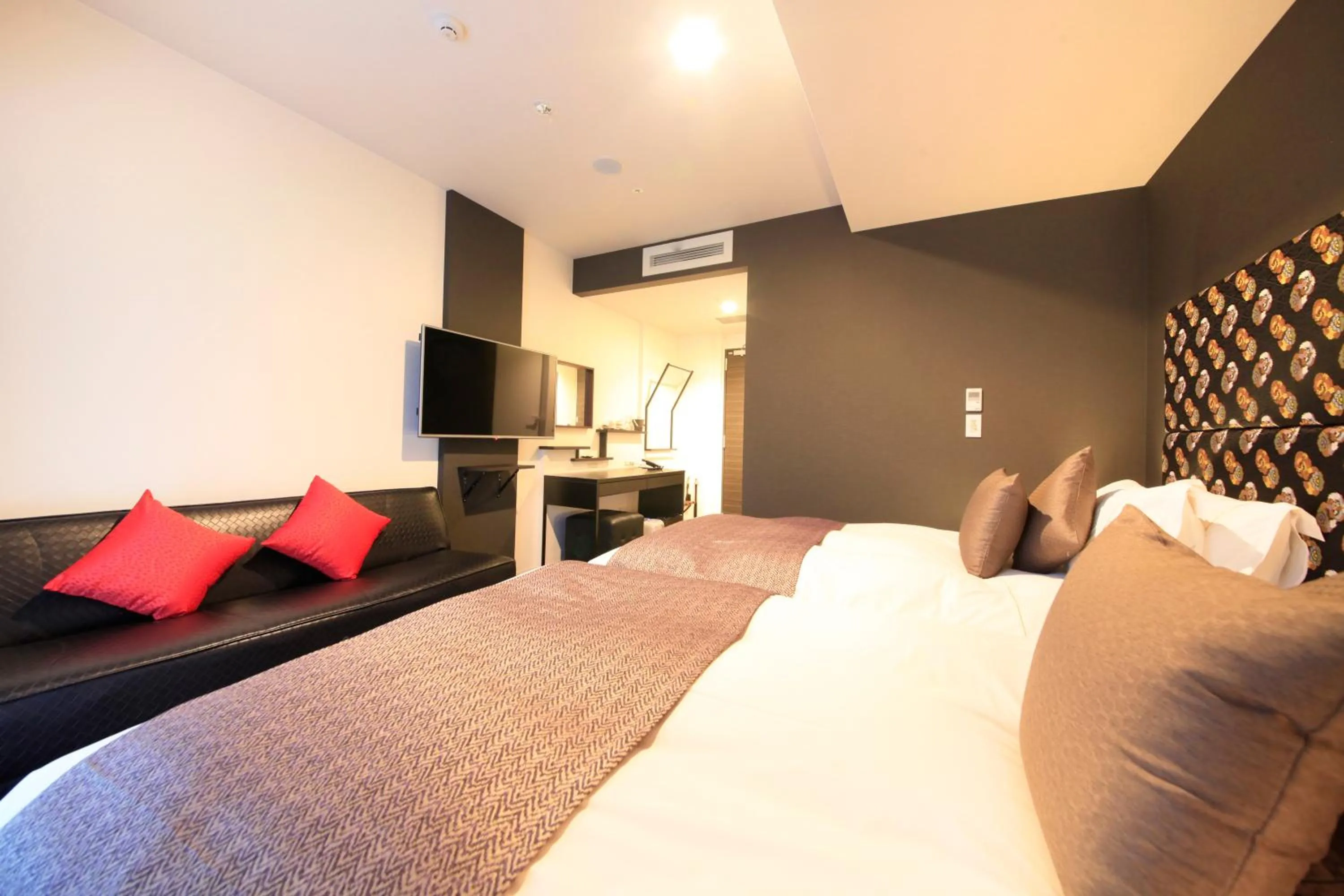 Photo of the whole room, Bed in Centurion Hotel Ikebukuro Station