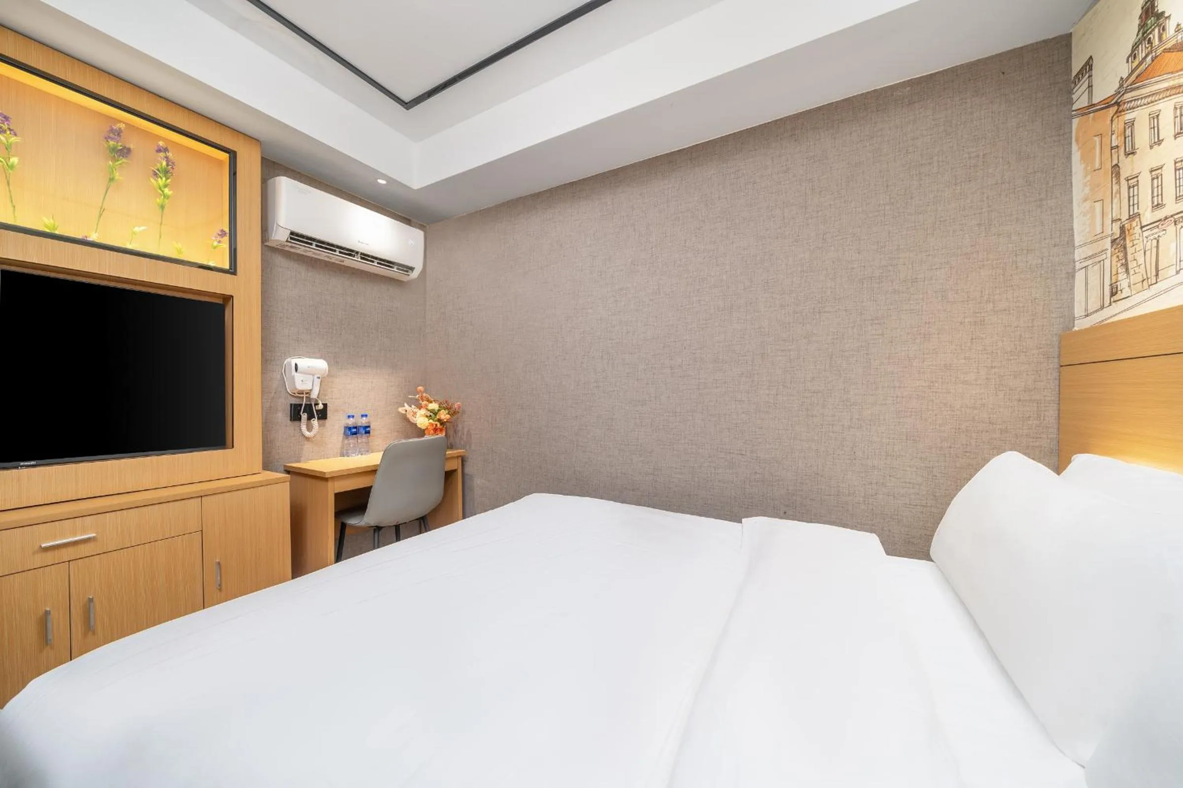 Bed in Yi Nuo Hotel Guangzhou