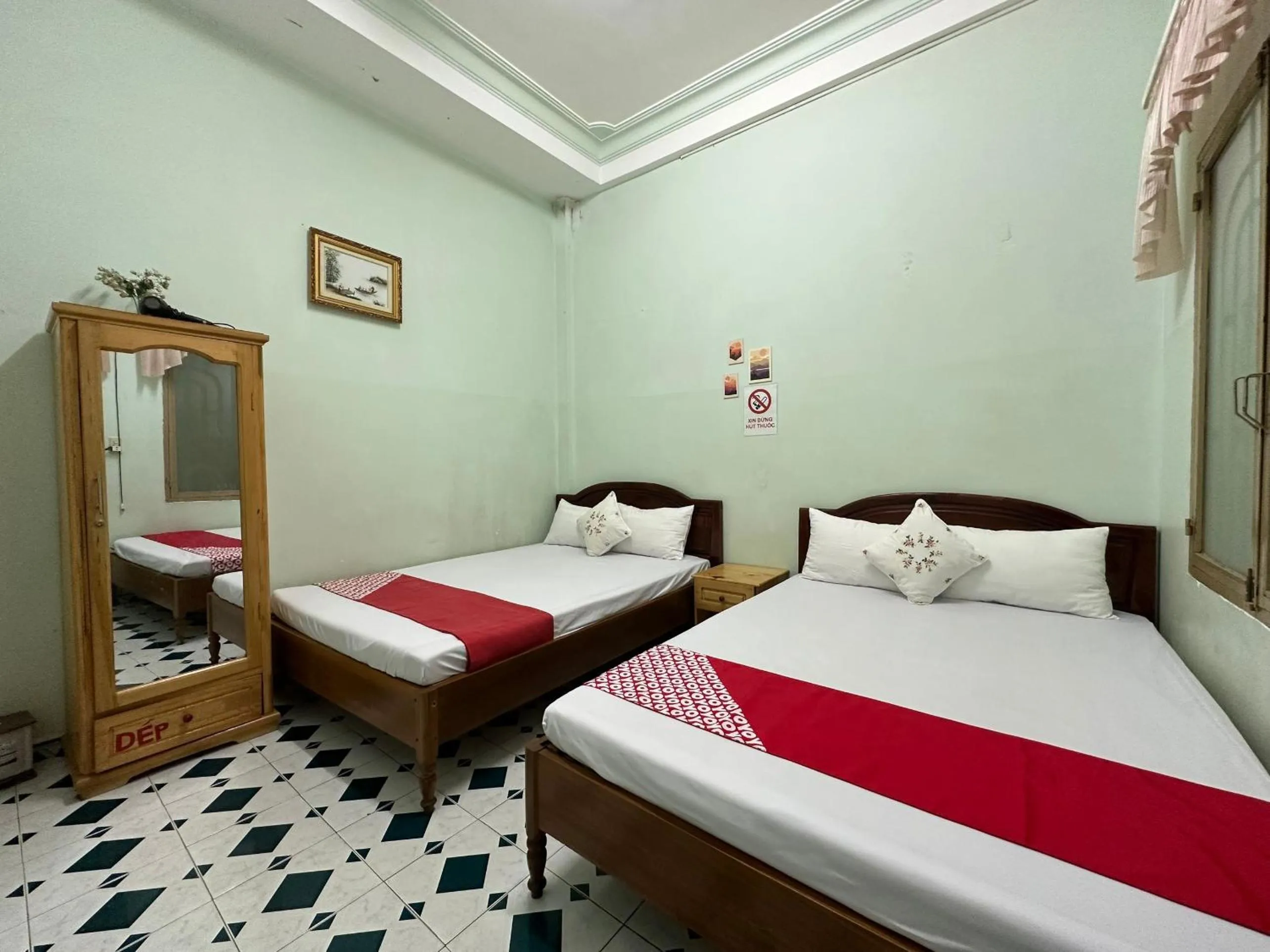 Bedroom, Bed in OYO 1206 Toan Thang Homestay