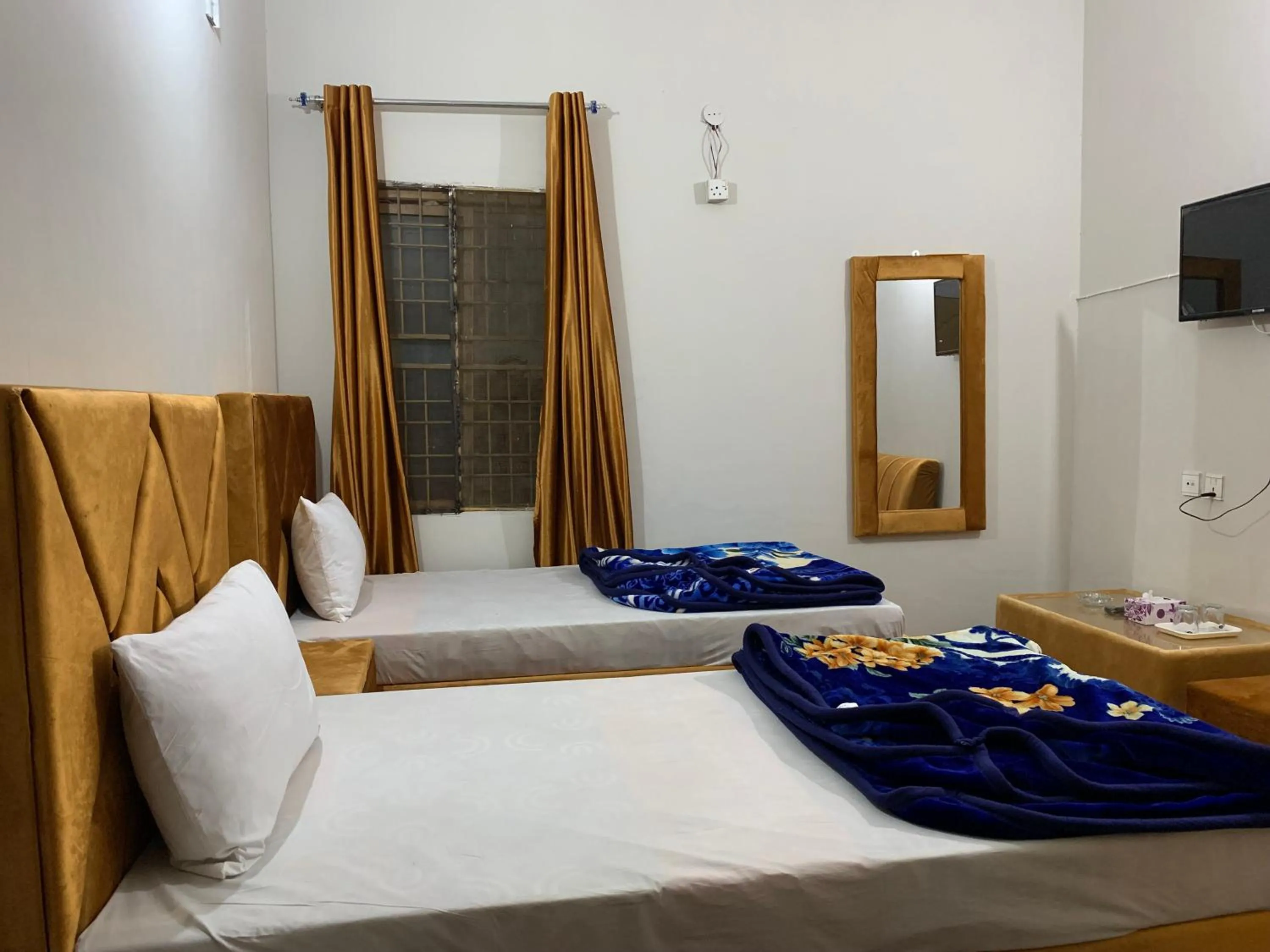 Bed in Eden Plus Executive Hotel