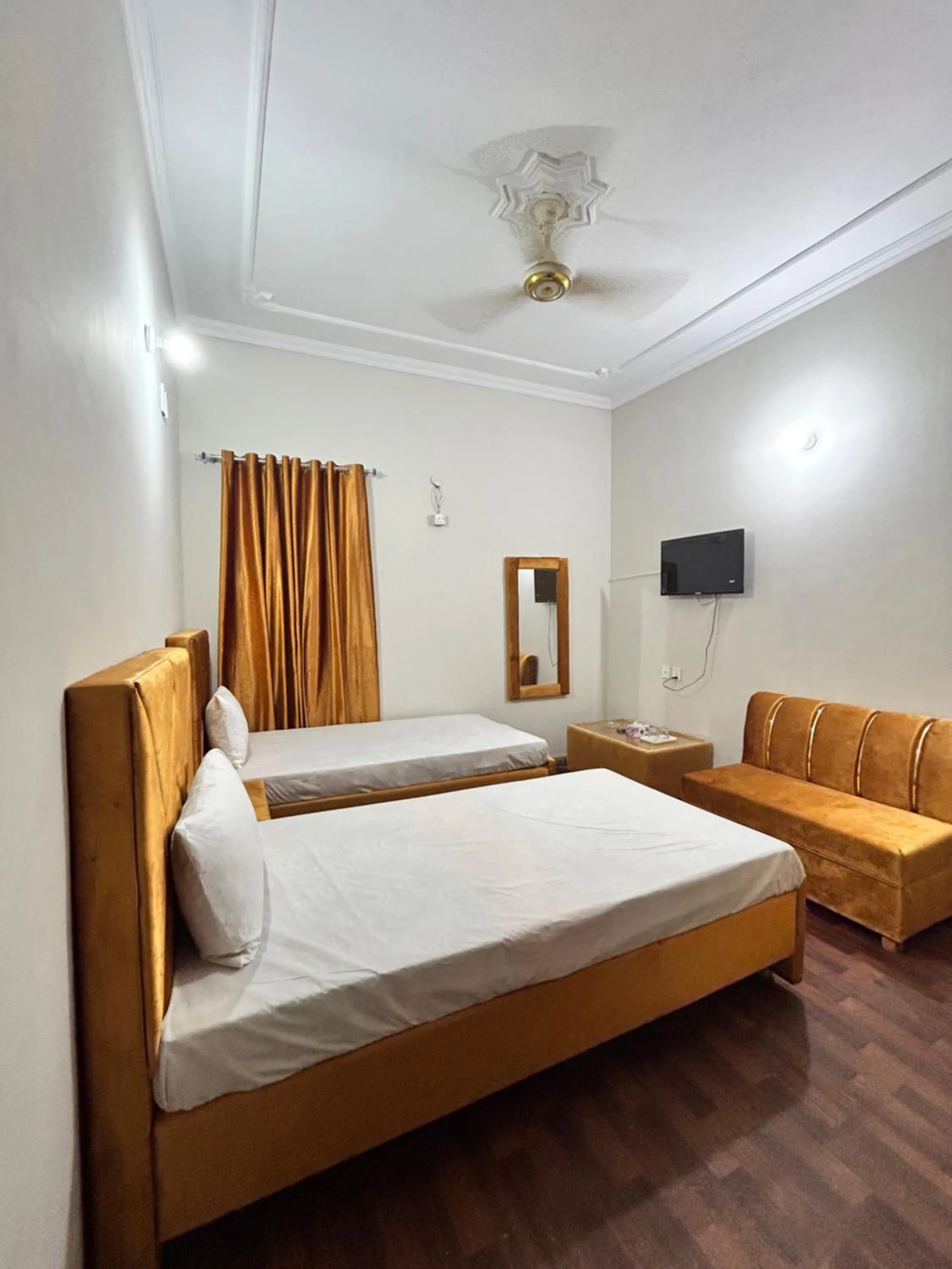 Bed in Eden Plus Executive Hotel