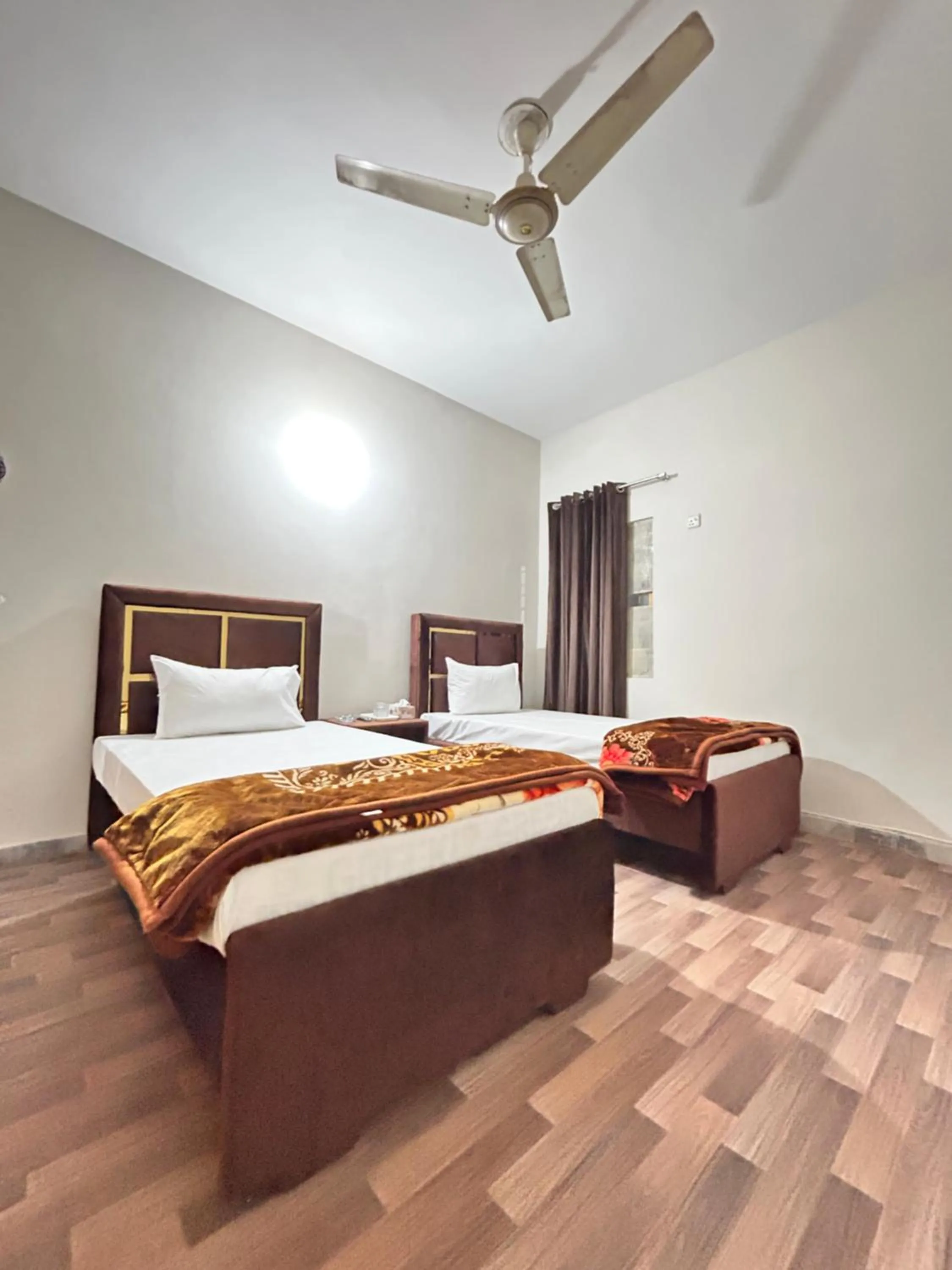 Bed in Eden Plus Executive Hotel