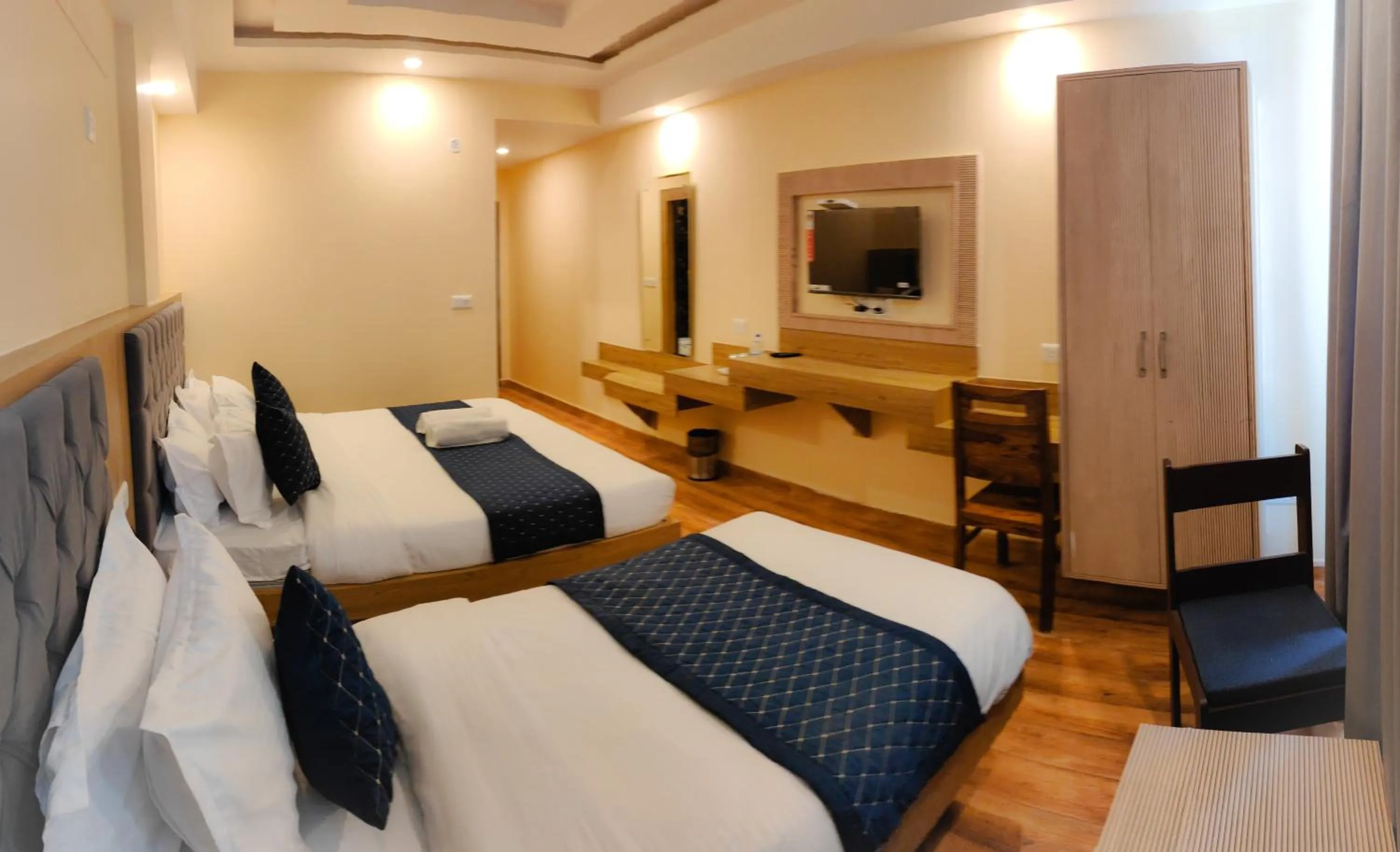 Bed in The Fragrance Hotel