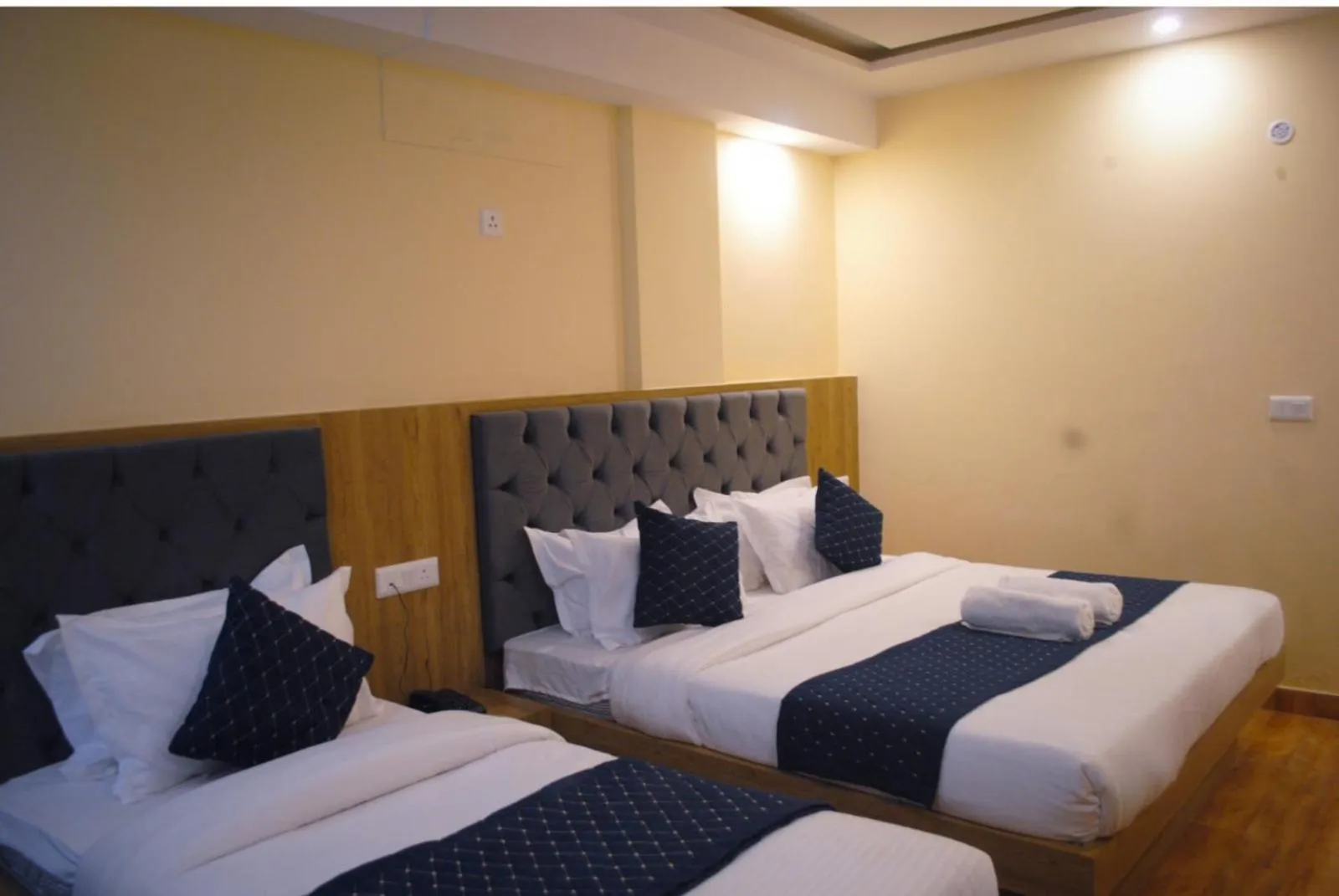 Bed in The Fragrance Hotel