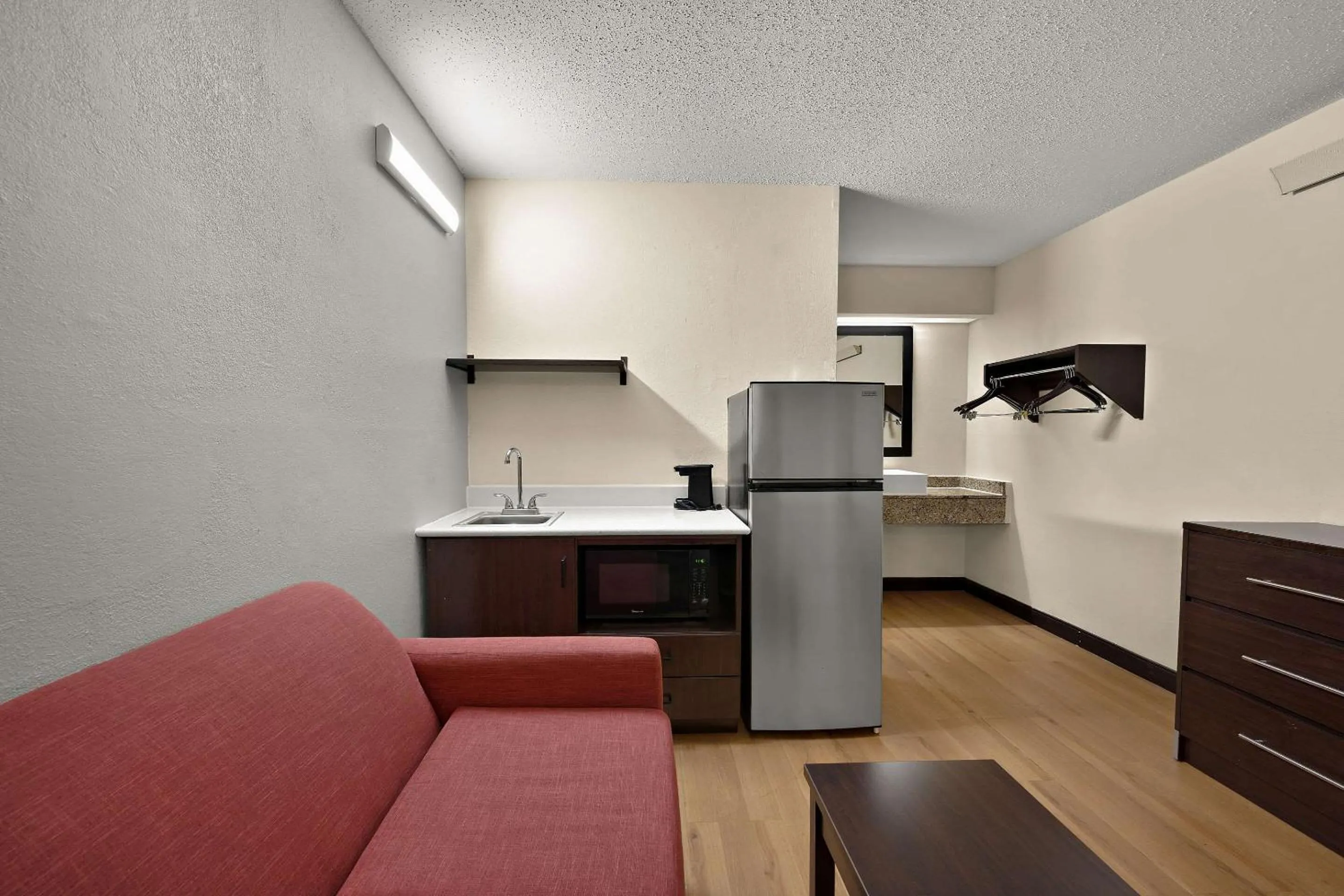 Bedroom in Suburban Studios Peoria