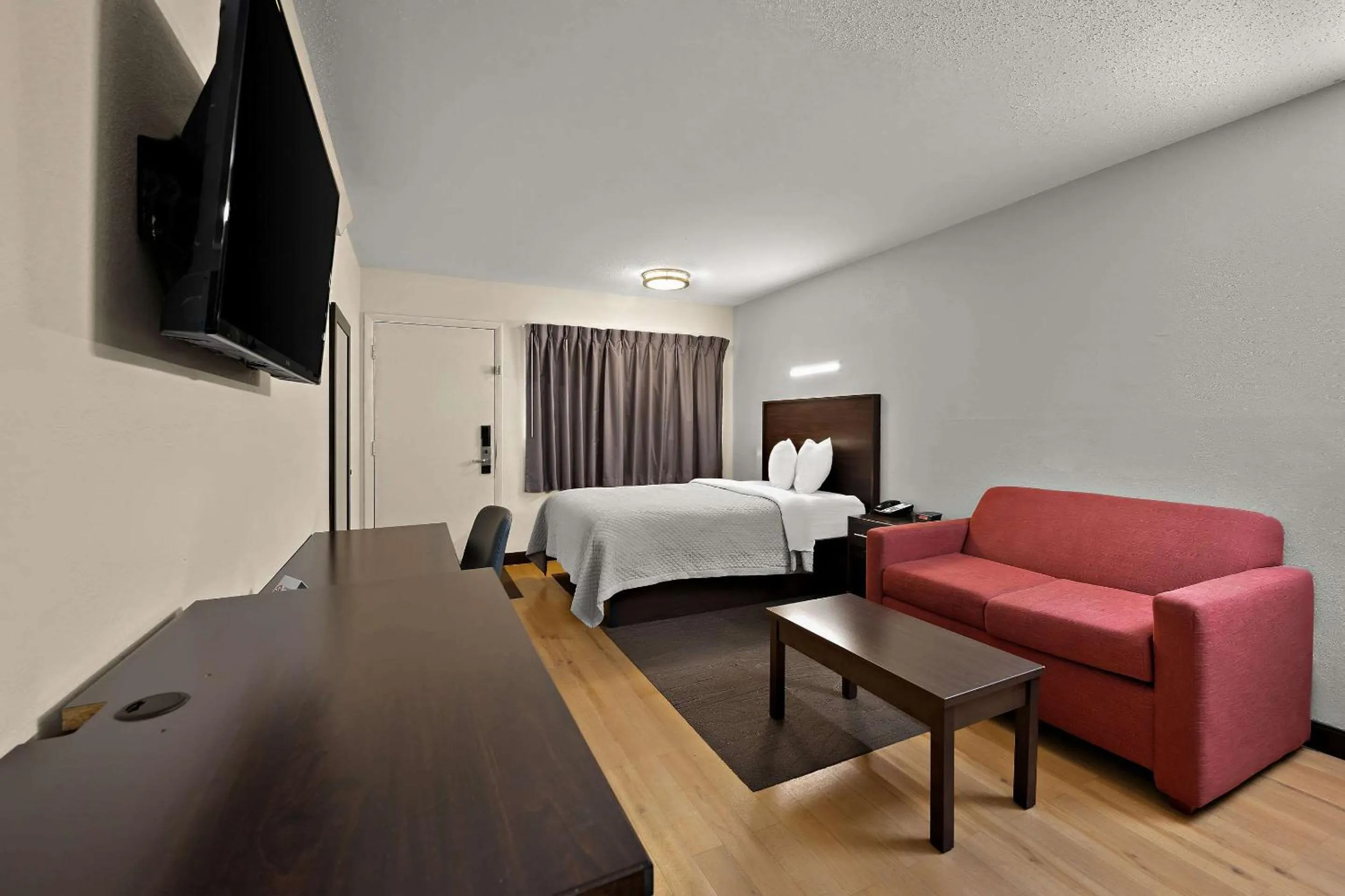 Bedroom, Bed in Suburban Studios Peoria