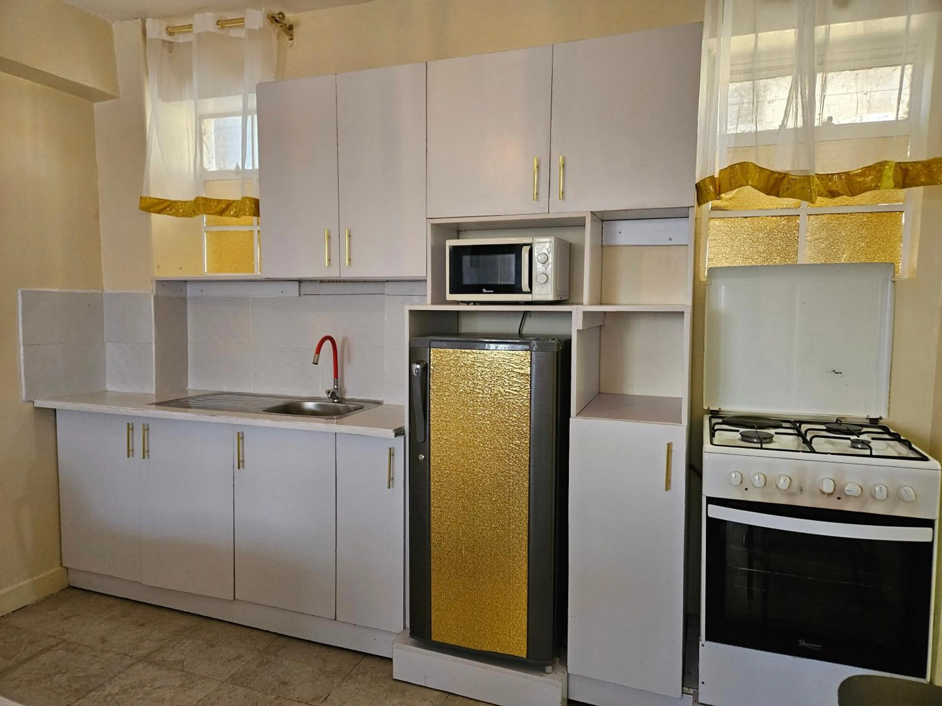 Kitchen or kitchenette in Airport Studio Apartments-JKIA