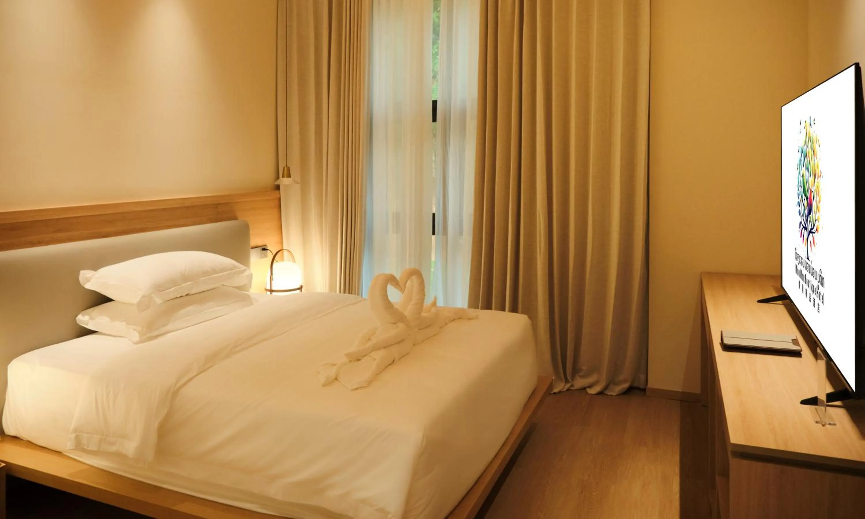 Bed in MonMonBoutique Hotel