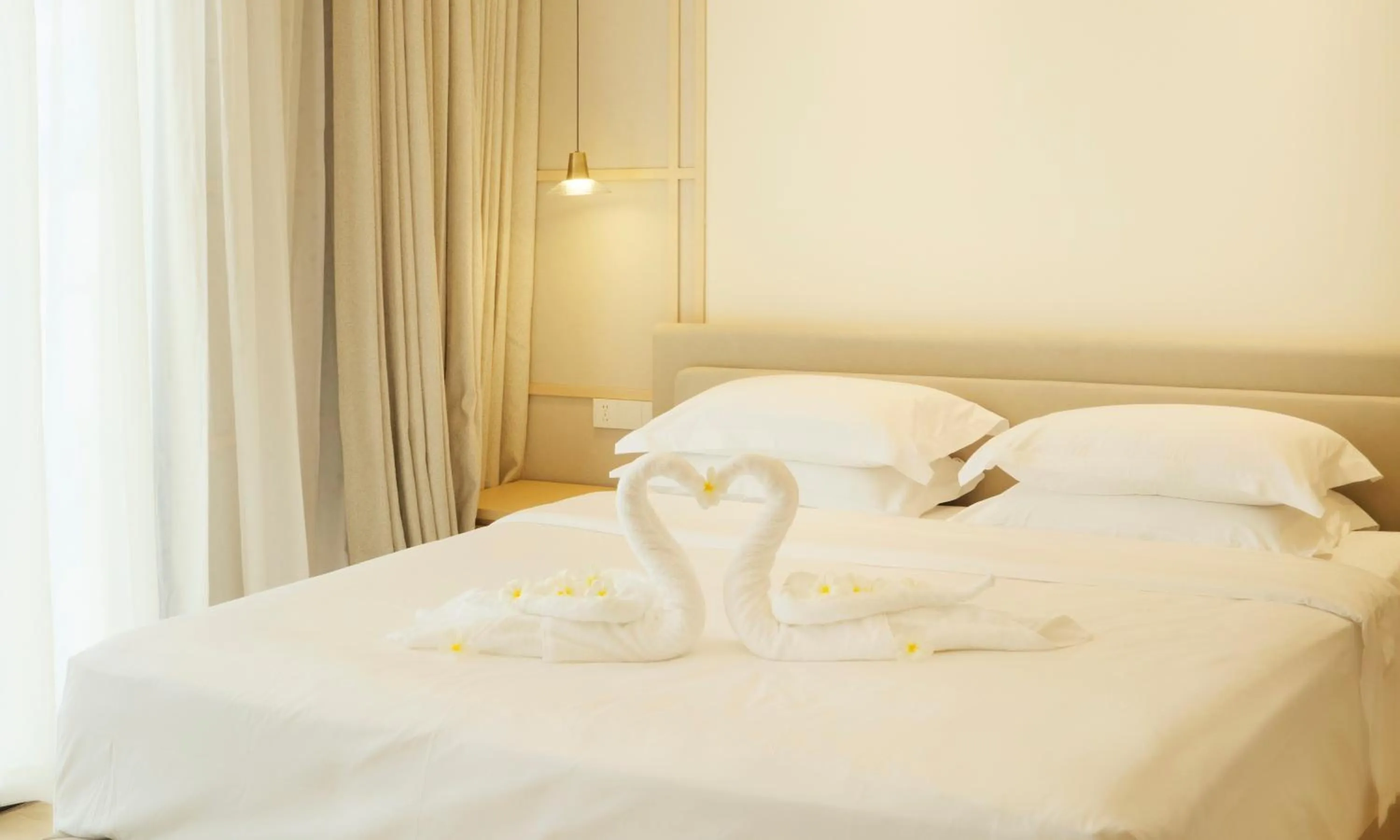 Bed in MonMonBoutique Hotel